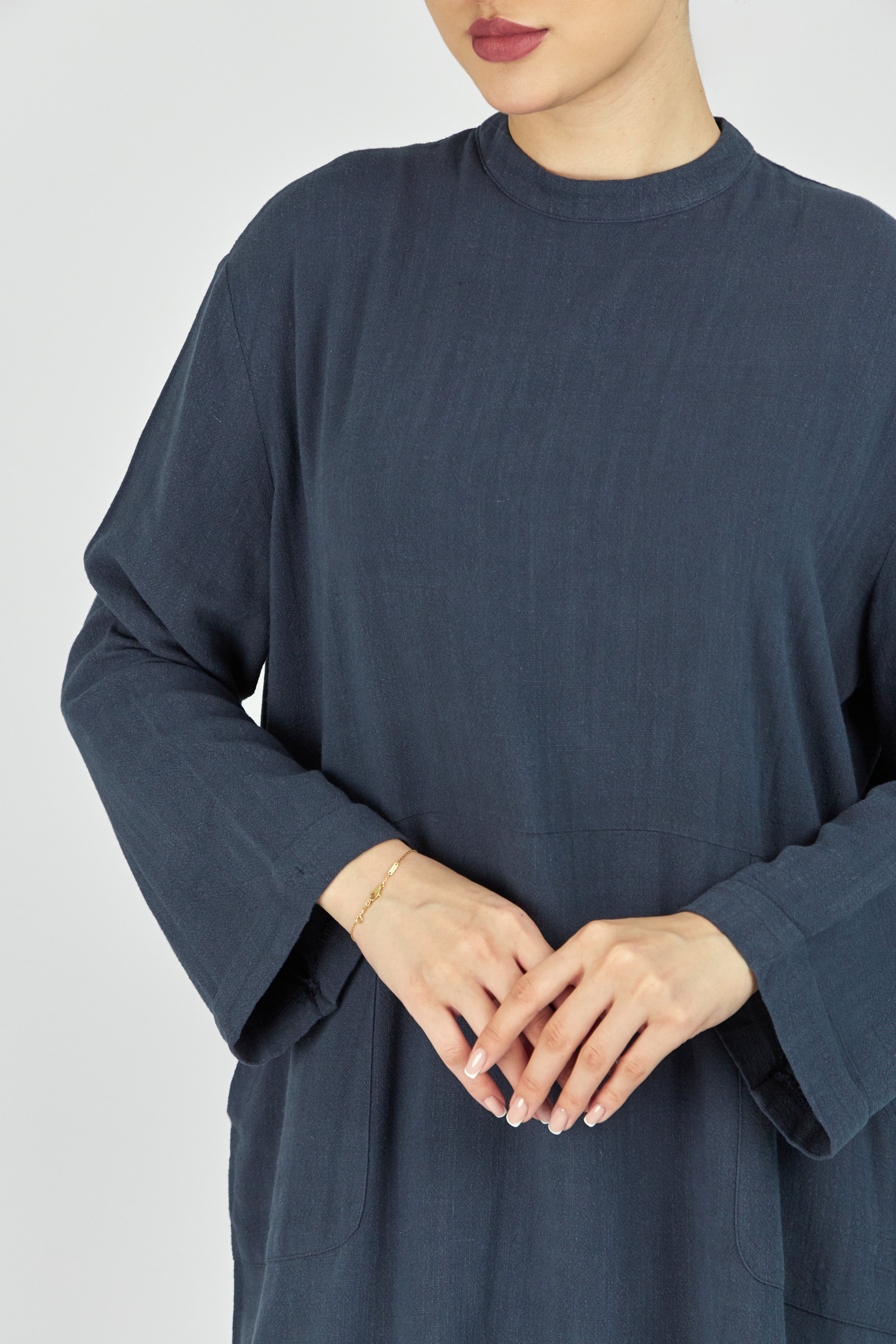 Colour: Royal Blue. A close up of a model showing the Linen Blend Top.