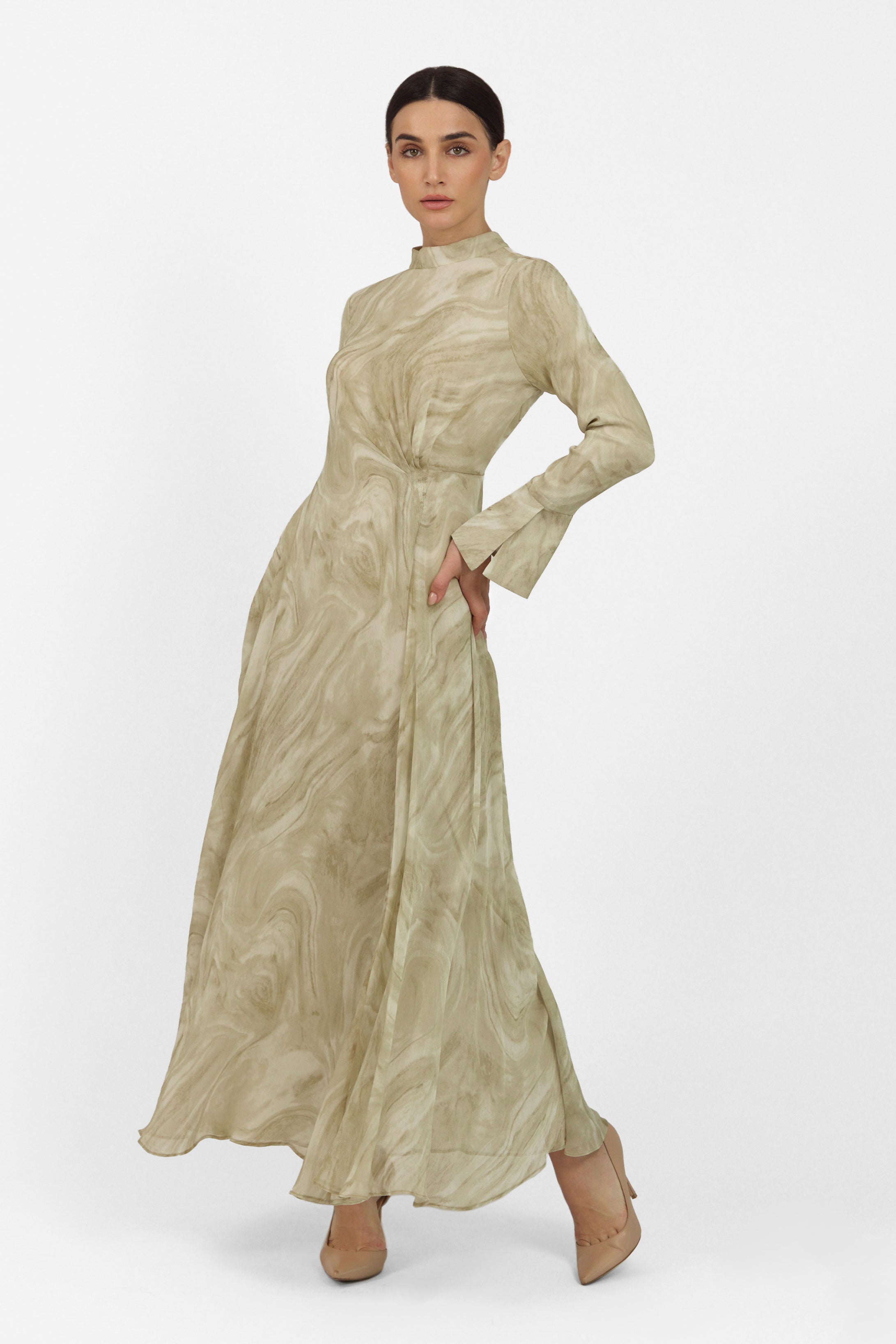 A model is posing in a Printed Watercolour Dress