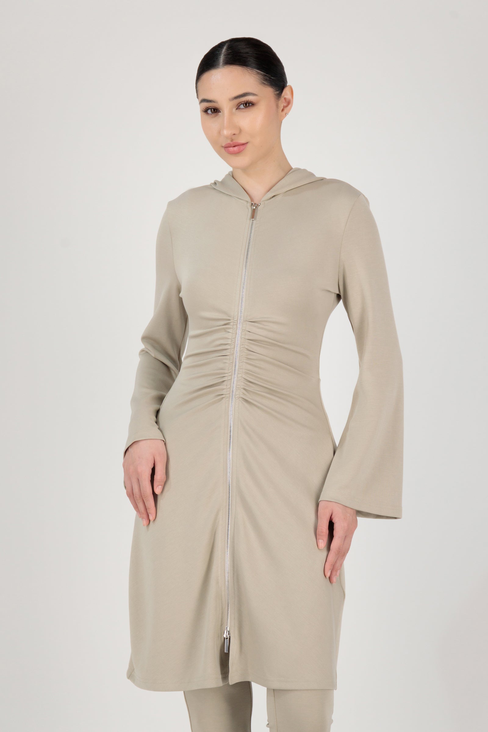 FARES Buttery Gathered Waist Long Hoodie in Stone shown from the front as an essential hoodie with a soft drape and modest longline silhouette.