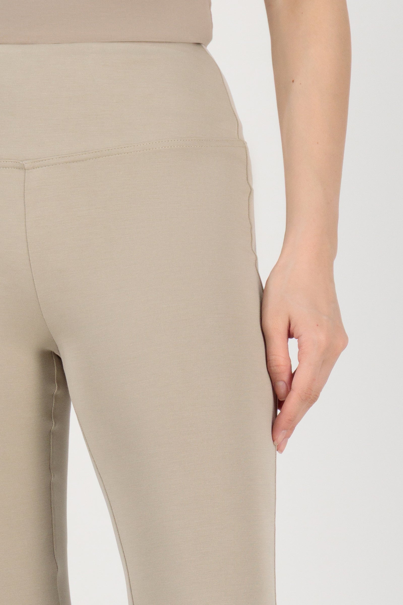 Close-up detail of the FARES Buttery Flared Leggings in Stone focusing on the fabric texture and seamless finish of these leggings.