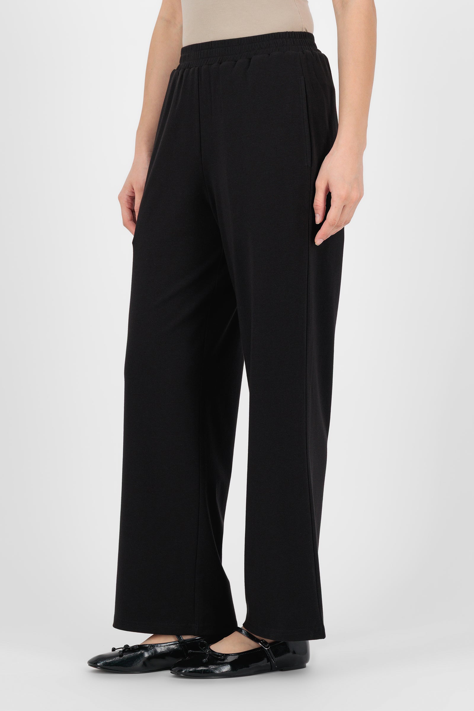 Alternate front pose of the Black Elastic Waist Straight Leg Trouser capturing the effortless fit and minimal detailing that make these trouser pants for women versatile for daily wear.