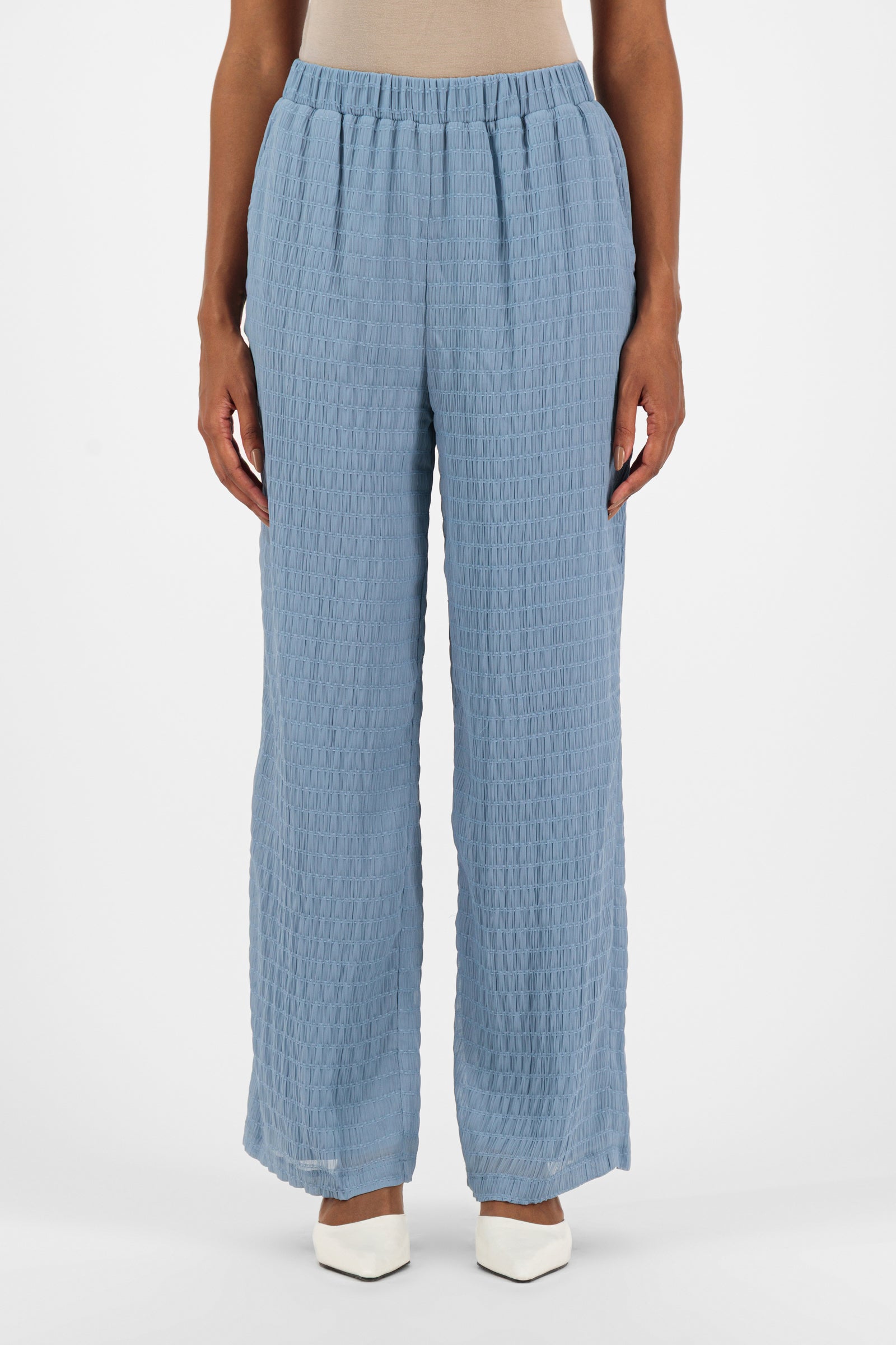 Front view of the FARES Shirred Wide Leg Pants in Berry, a lightweight pair of wide leg pants with a relaxed fit and soft shirred waistband.