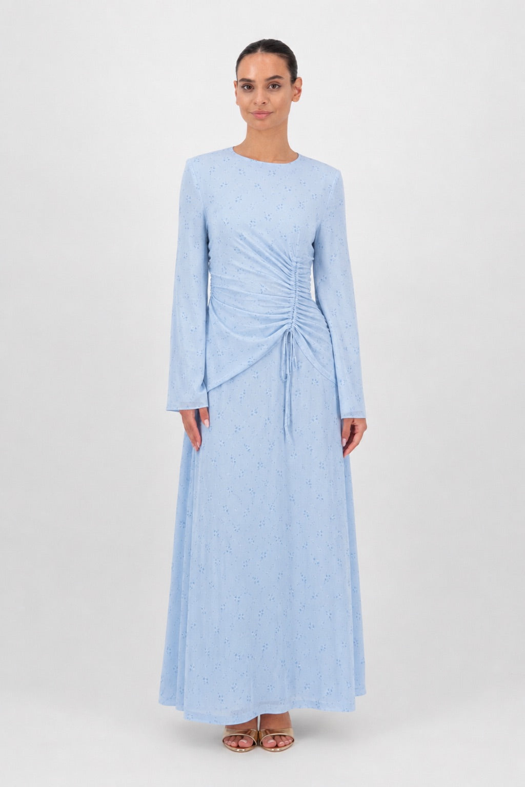 Woman wearing the Skyflower chiffon dress with a scrunched waist, front view.