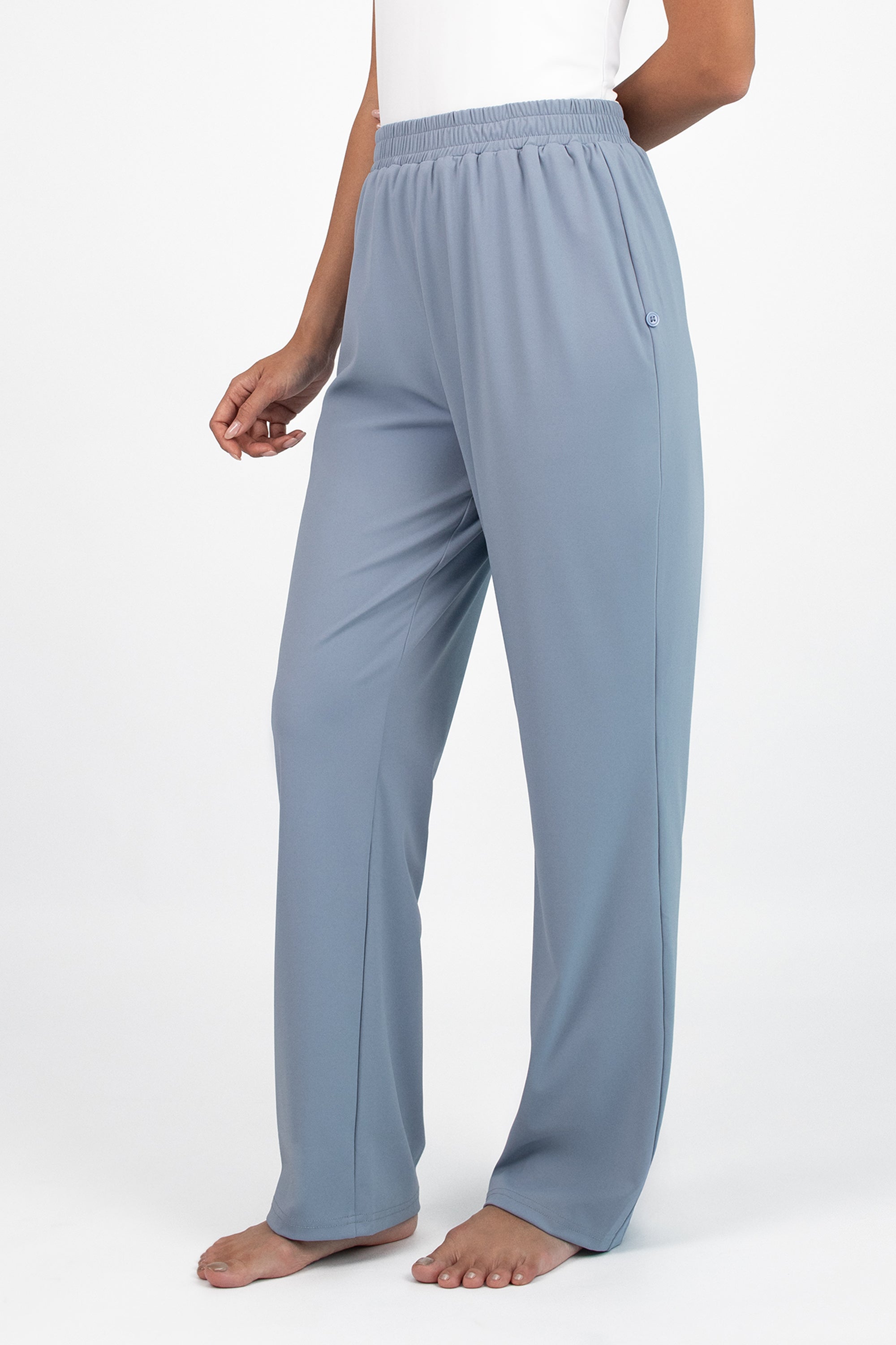 Model wearing the FARES Gathered Quick-Dry Modest Swim Set in Coastal Blue, styled to highlight the modest and functional appeal of swim suits for ladies.