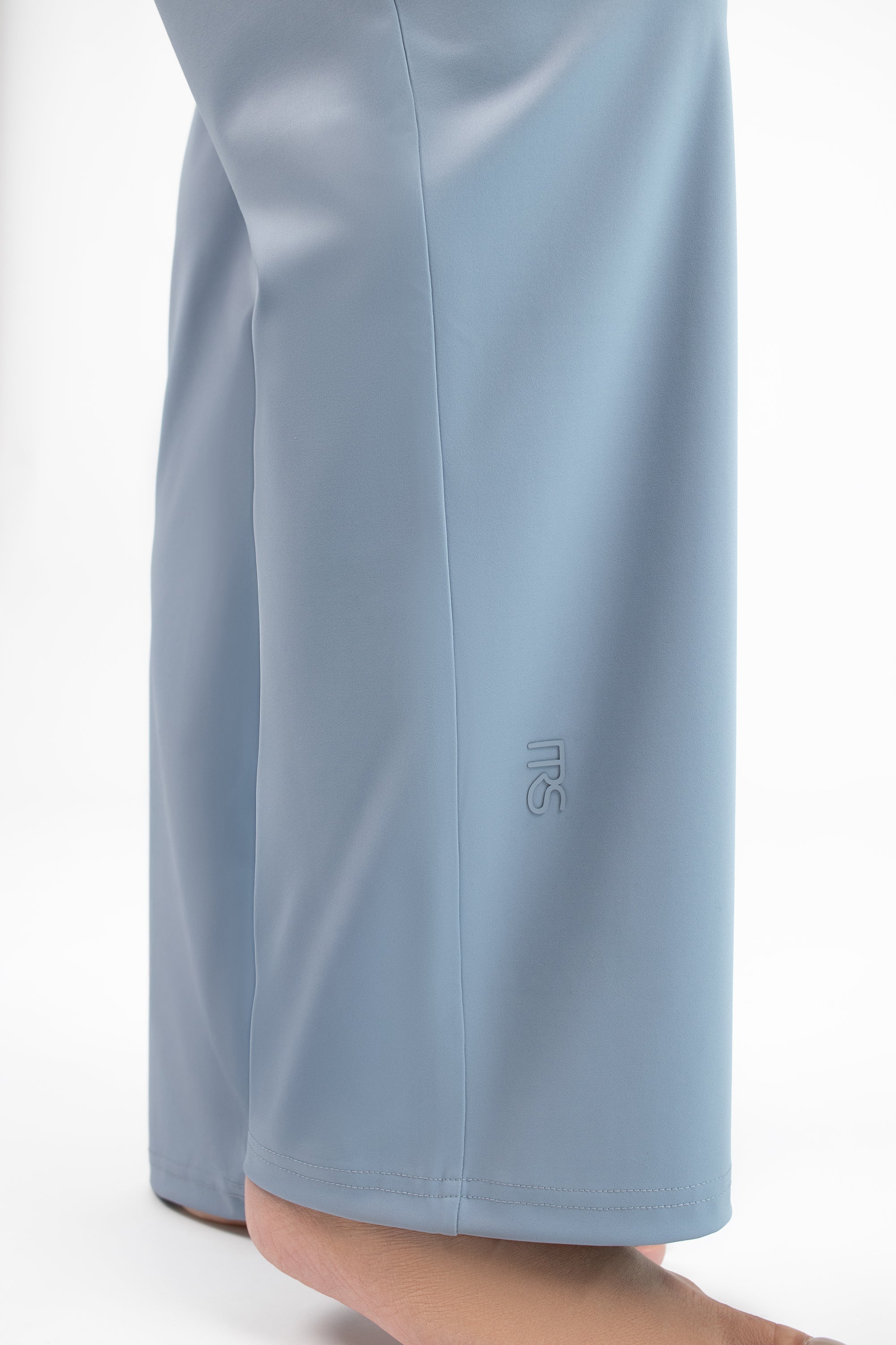 Flat lay of the FARES Gathered Quick-Dry Modest Swim Set in Coastal Blue, displaying the full set including top and leggings.