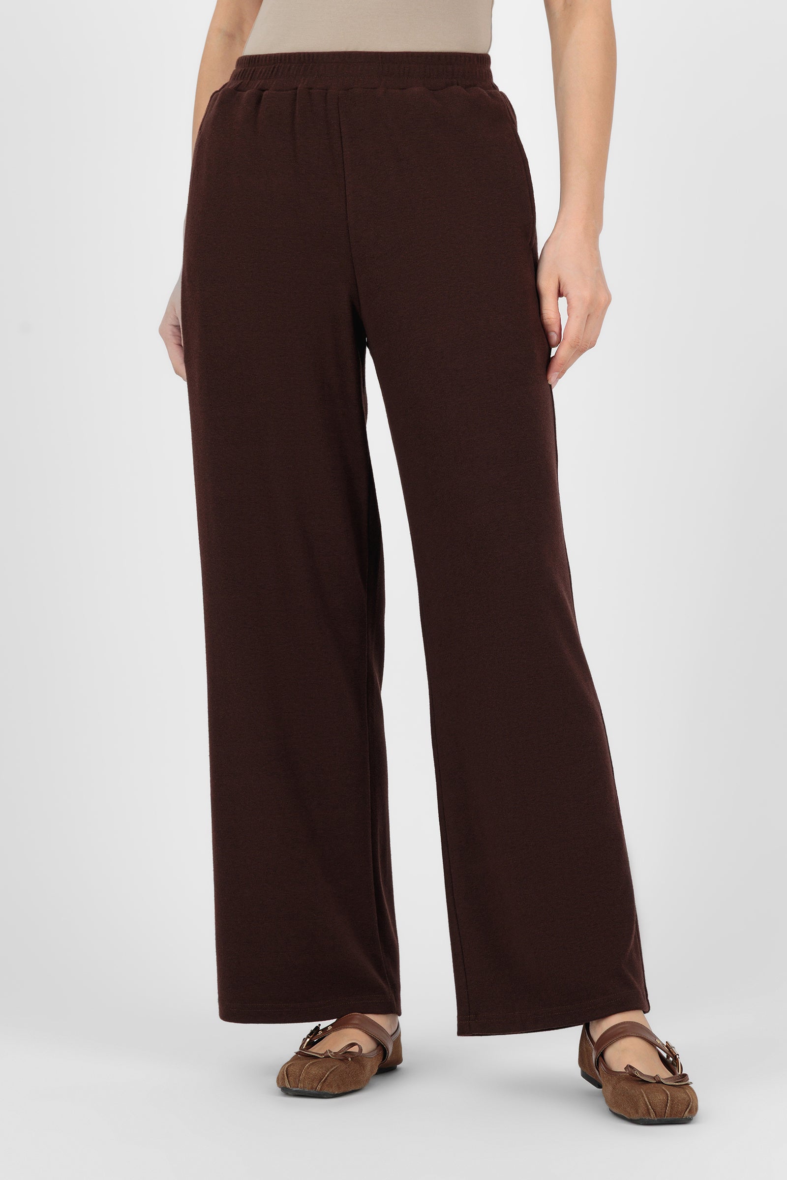 Model wearing the Straight Leg Knit Pants in Espresso front view, showing the clean straight silhouette and soft knit texture that make these knit pants an easy everyday essential.