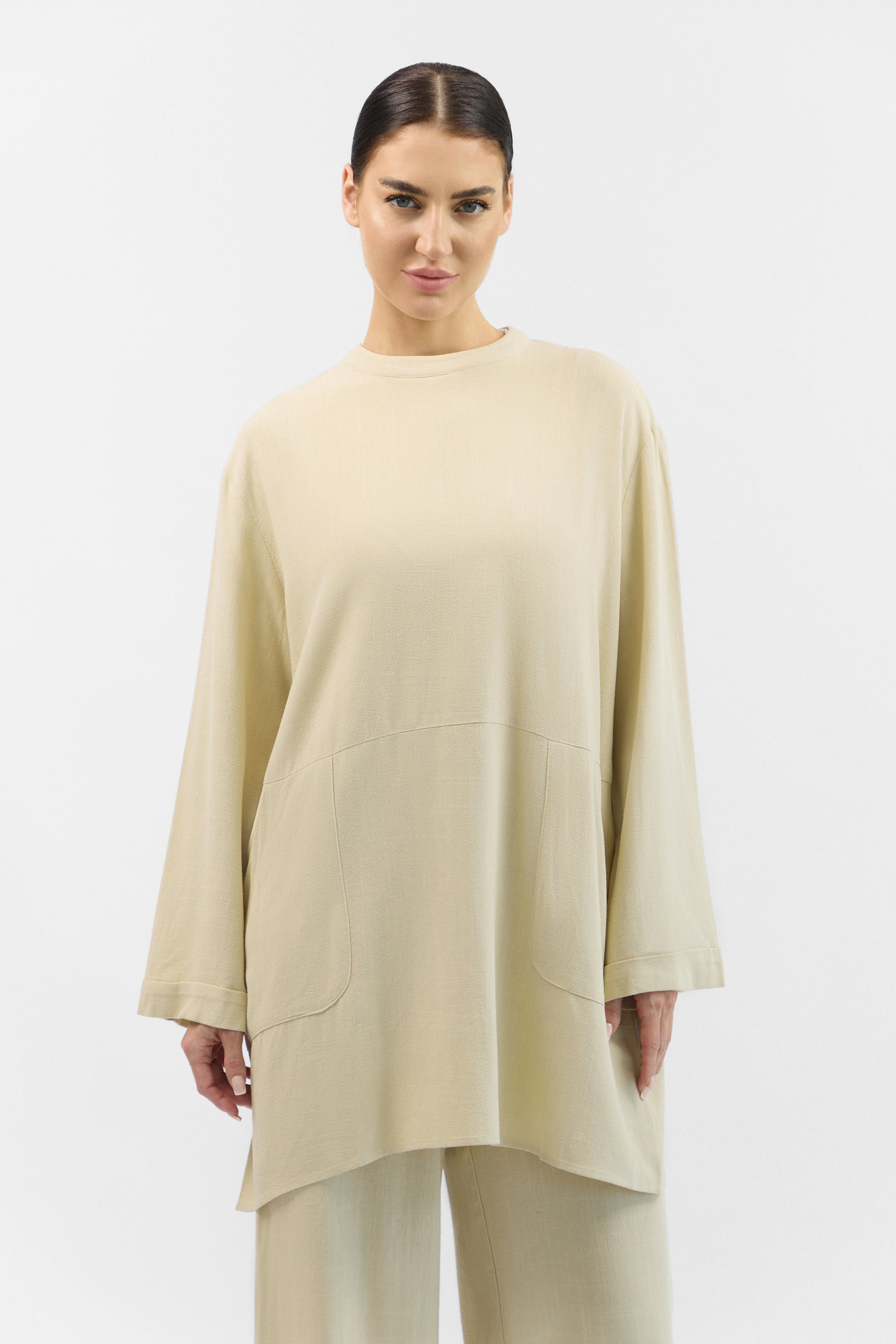 Front view of the FARES Linen Blend Top in Taupe, a breathable and relaxed-fit linen top with a minimal design.