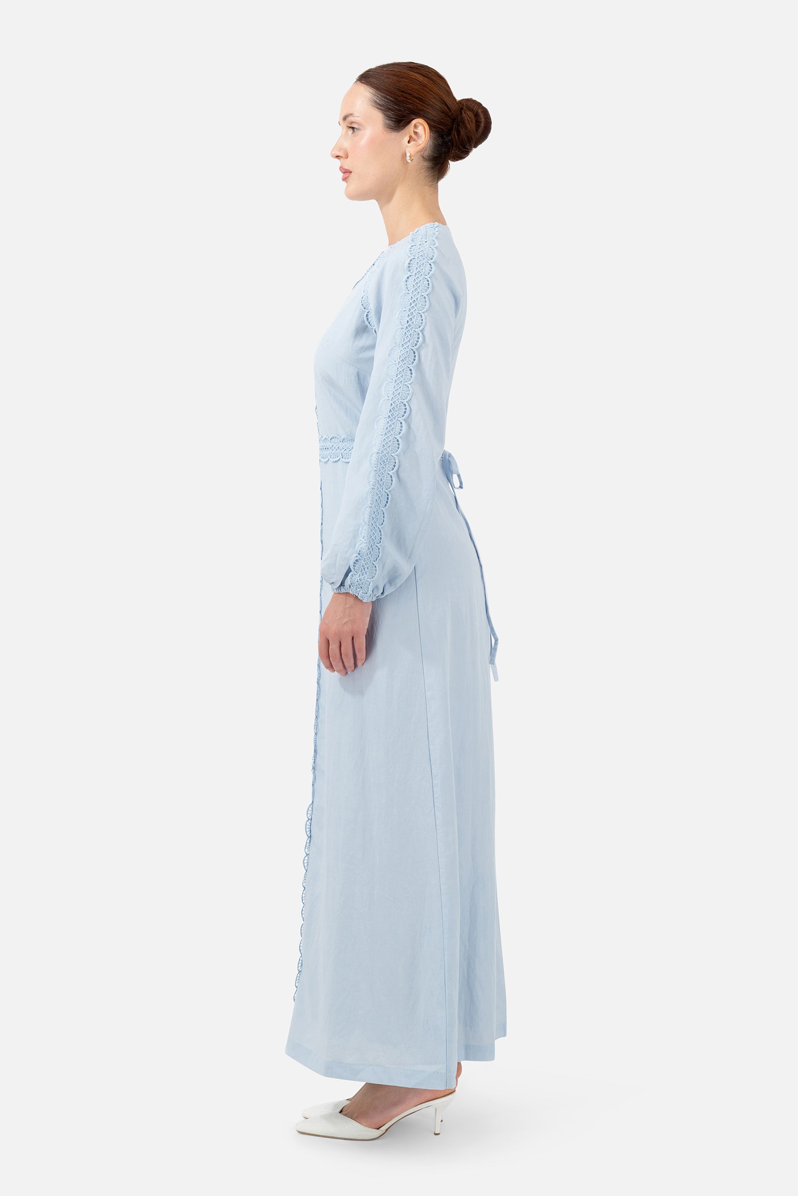 Side profile of the Bluebell crochet trim maxi dress highlighting the relaxed silhouette.