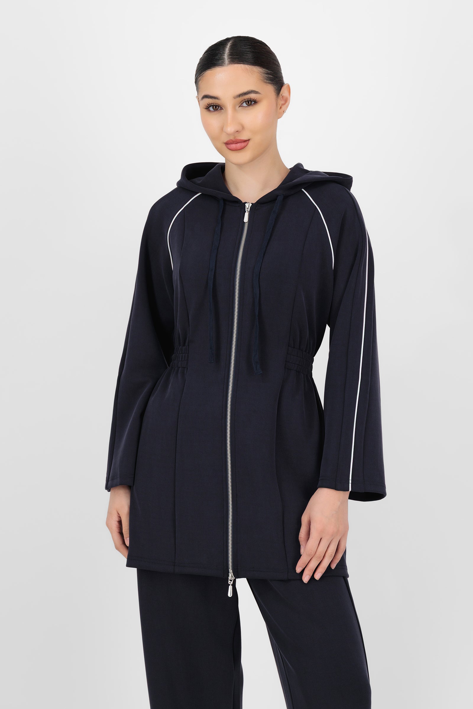 Model wearing the Buttery Contrast Detail Hoodie in Midnight Blue front view, showing the soft fit and clean contrast detailing that make it a cozy staple in hoodies for women.