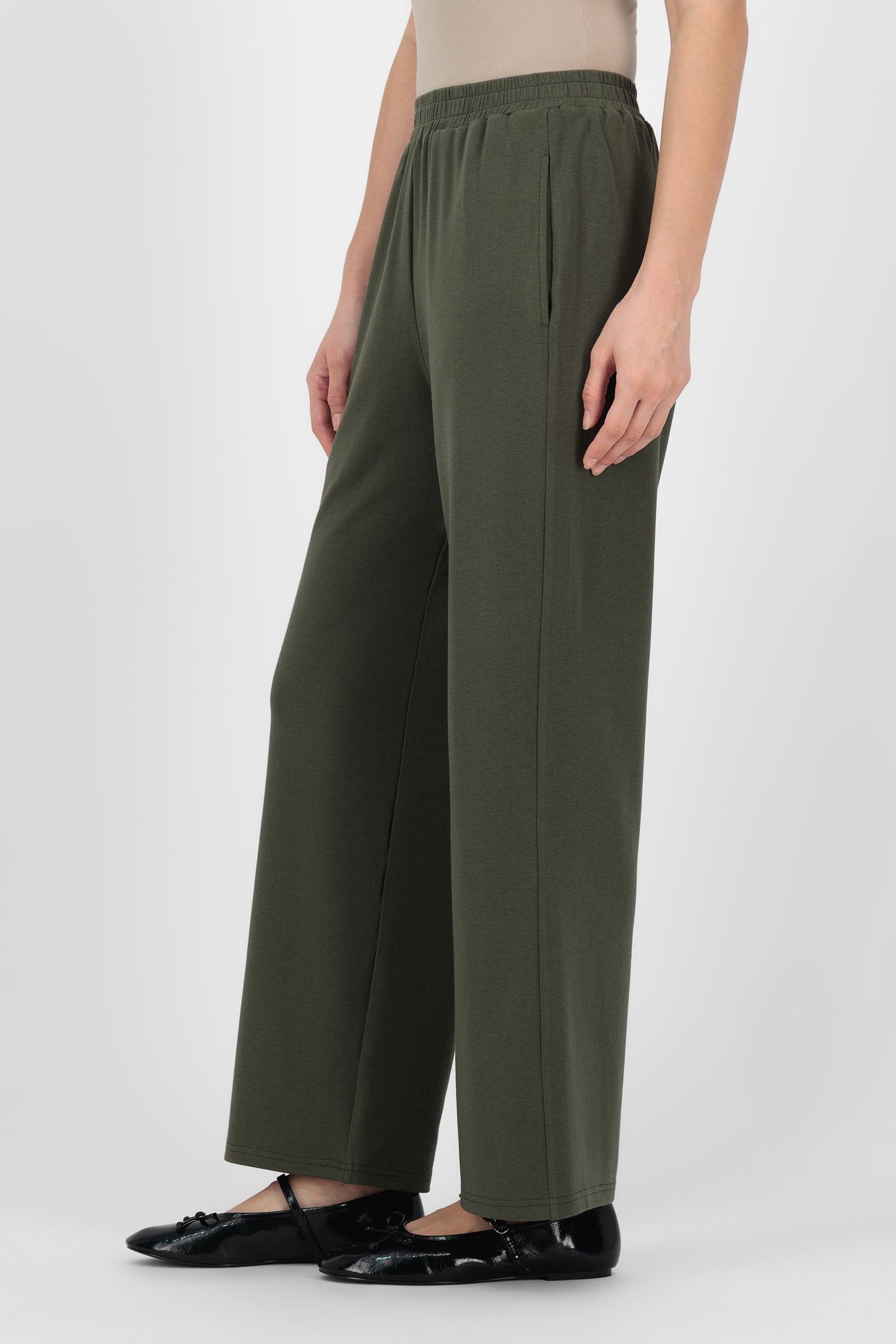 Side angle of the Elastic Waist Straight Leg Trouser Evergreen capturing the soft drape and streamlined shape that elevate this classic straight leg trouser.