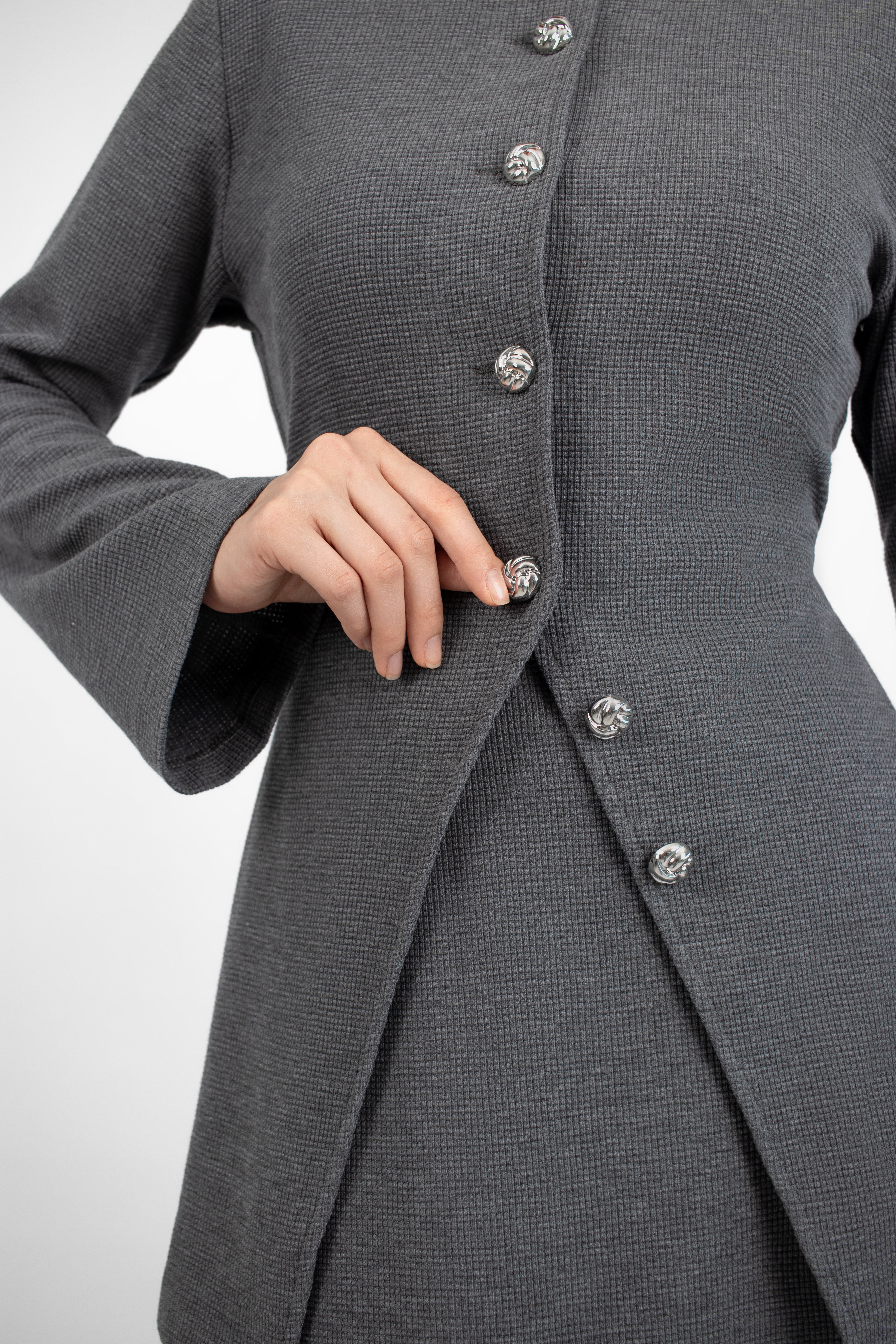 A close up of the Tailored Vintage Cardigan on a girl.