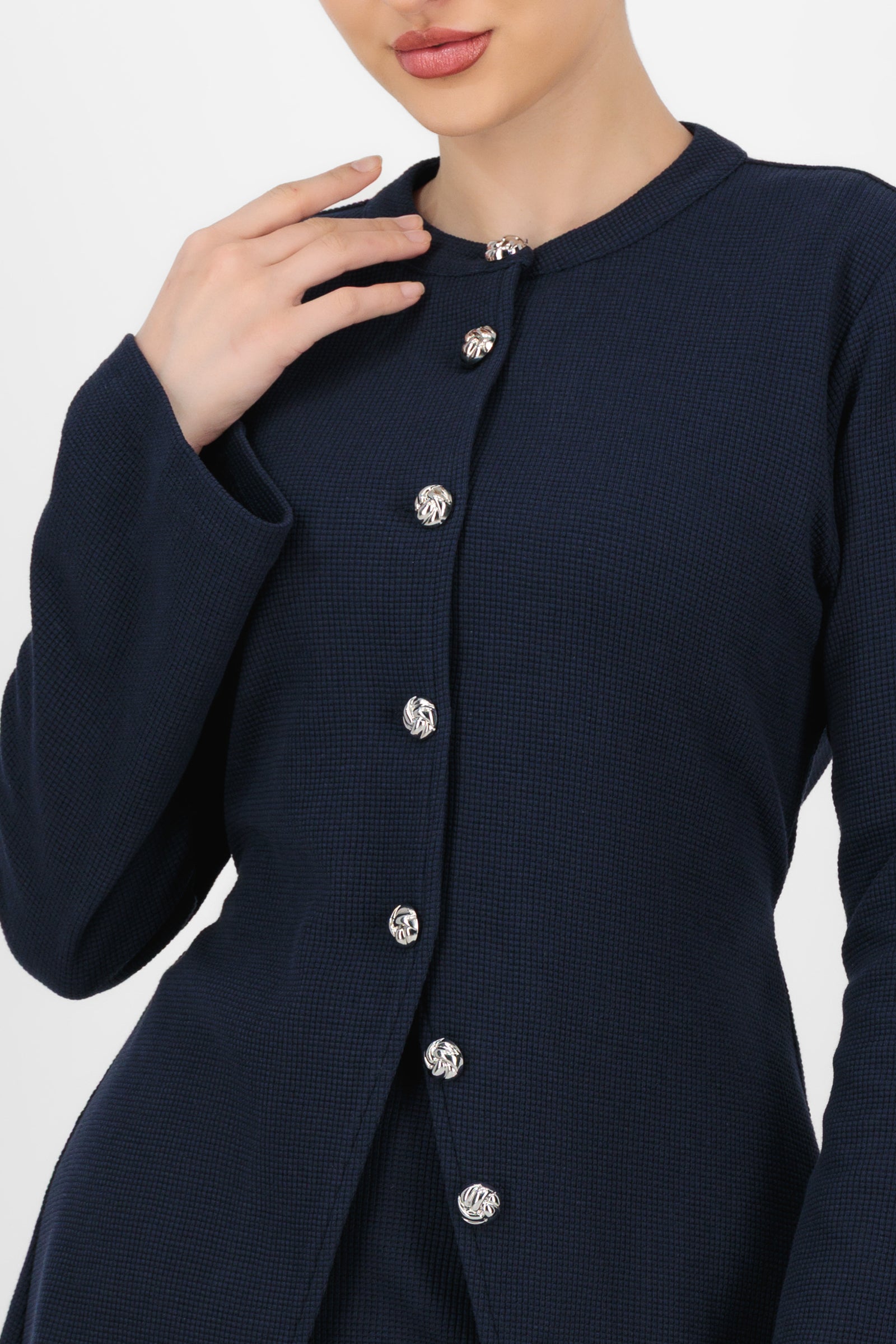 Close-up of the Tailored Vintage Cardigan in Navy focusing on the knit texture, buttons, and refined stitching that elevate this cardigan for women.