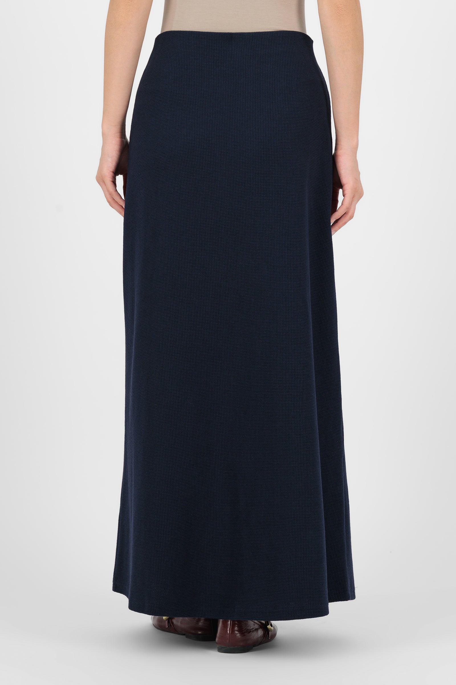 Back view of the Navy Tailored Maxi Skirt highlighting the smooth waistband and elegant flow that define polished, timeless maxi skirts.