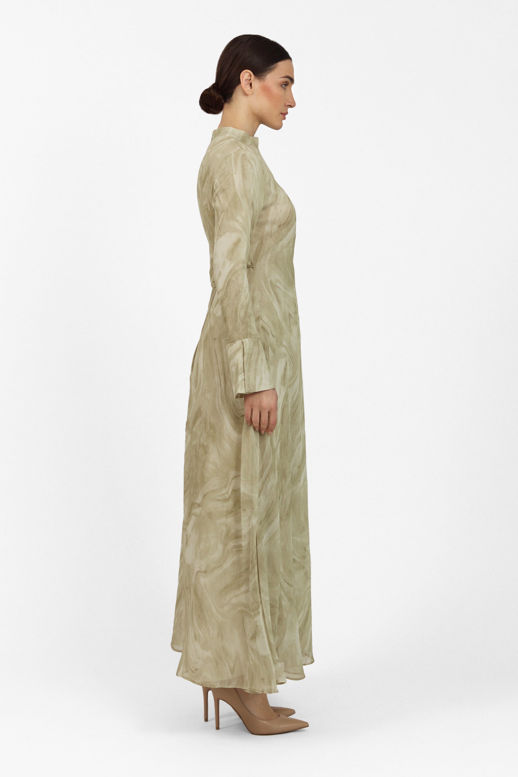 A side look of the model wearing a Printed Watercolour Dress