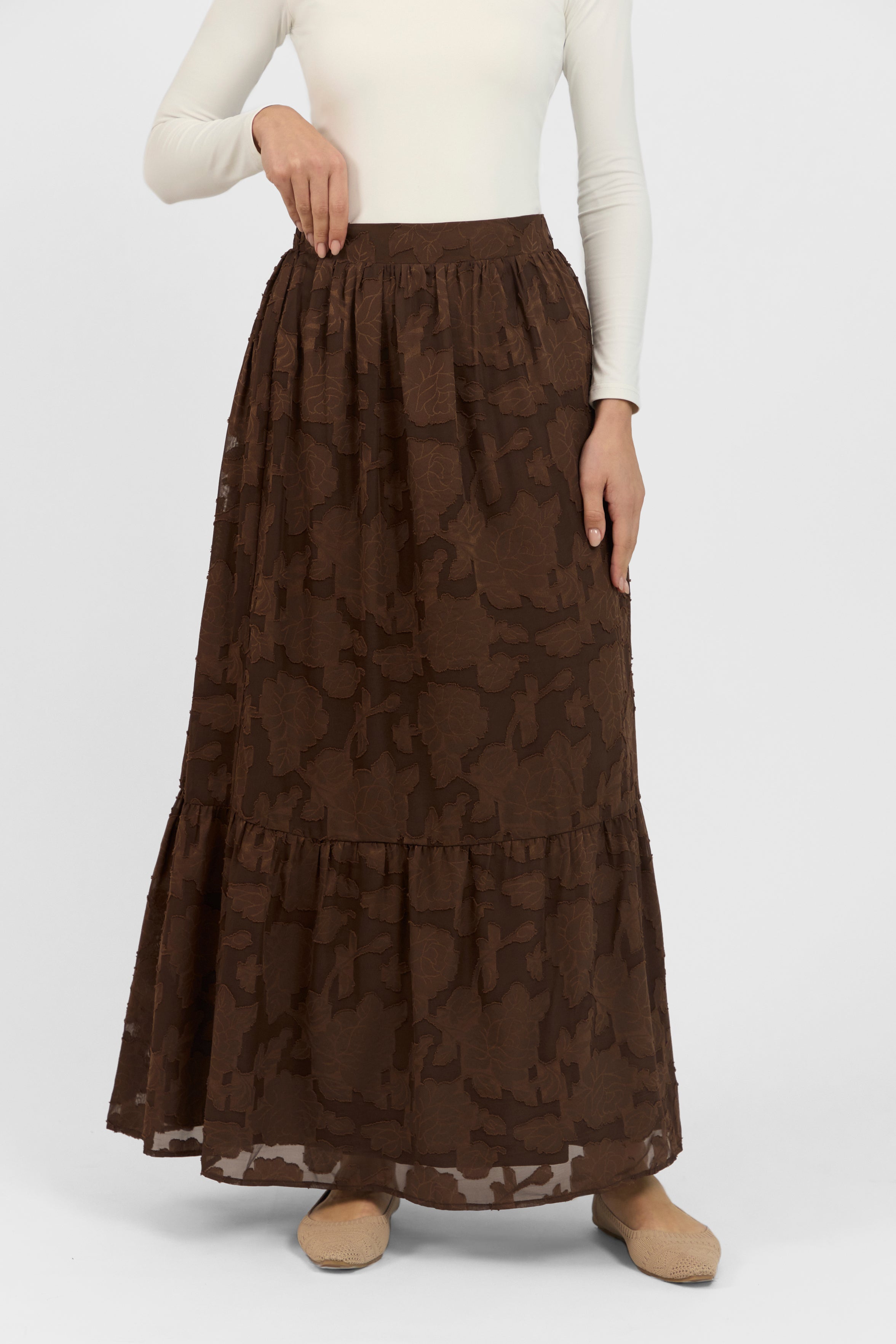 A front view of the skirt from the set.	Colour: Chocolate