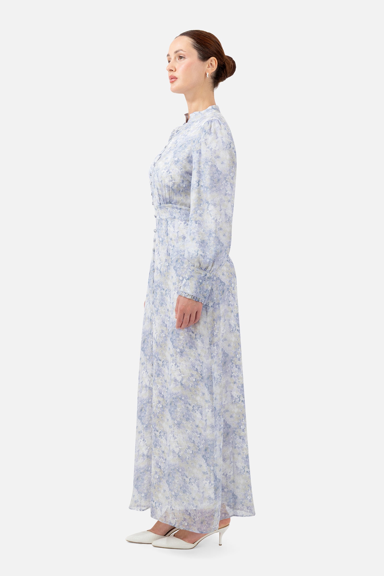 Side profile of the Blue Dreams Printed Vintage Detail Dress highlighting the relaxed fit and graceful drape.