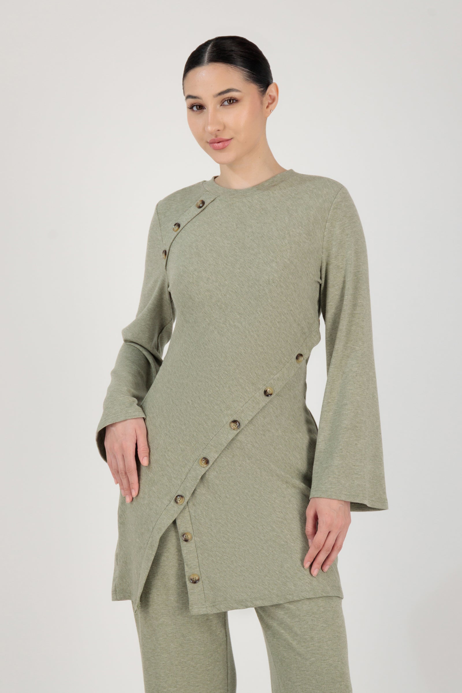FARES Button Detail Knit Tunic in Olive shown from the front as refined tunic clothing with a soft knit texture and modest longline silhouette.