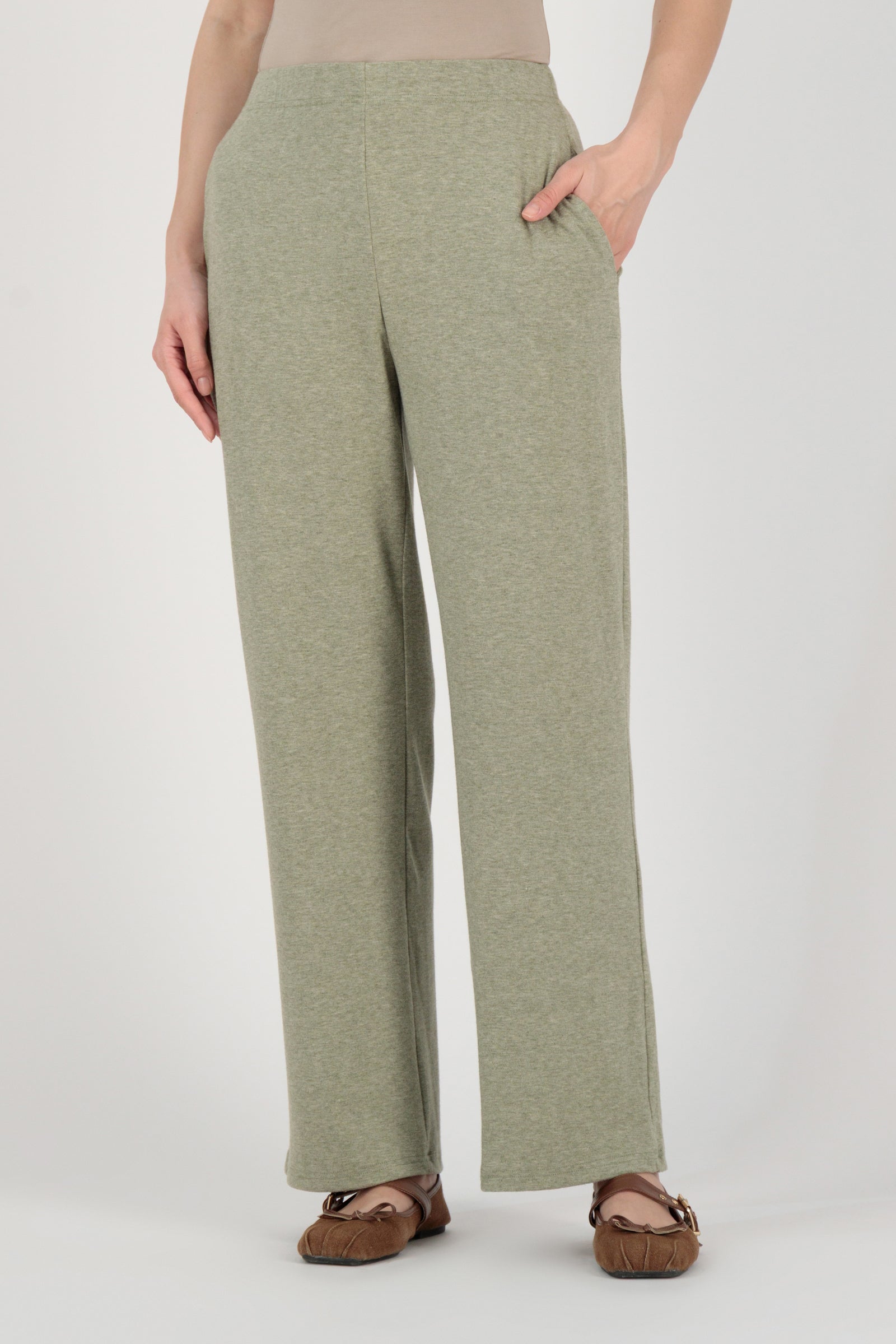Front angle of the FARES Straight Leg Knit Pants in Olive emphasizing the balanced silhouette and ease of straight leg pants.