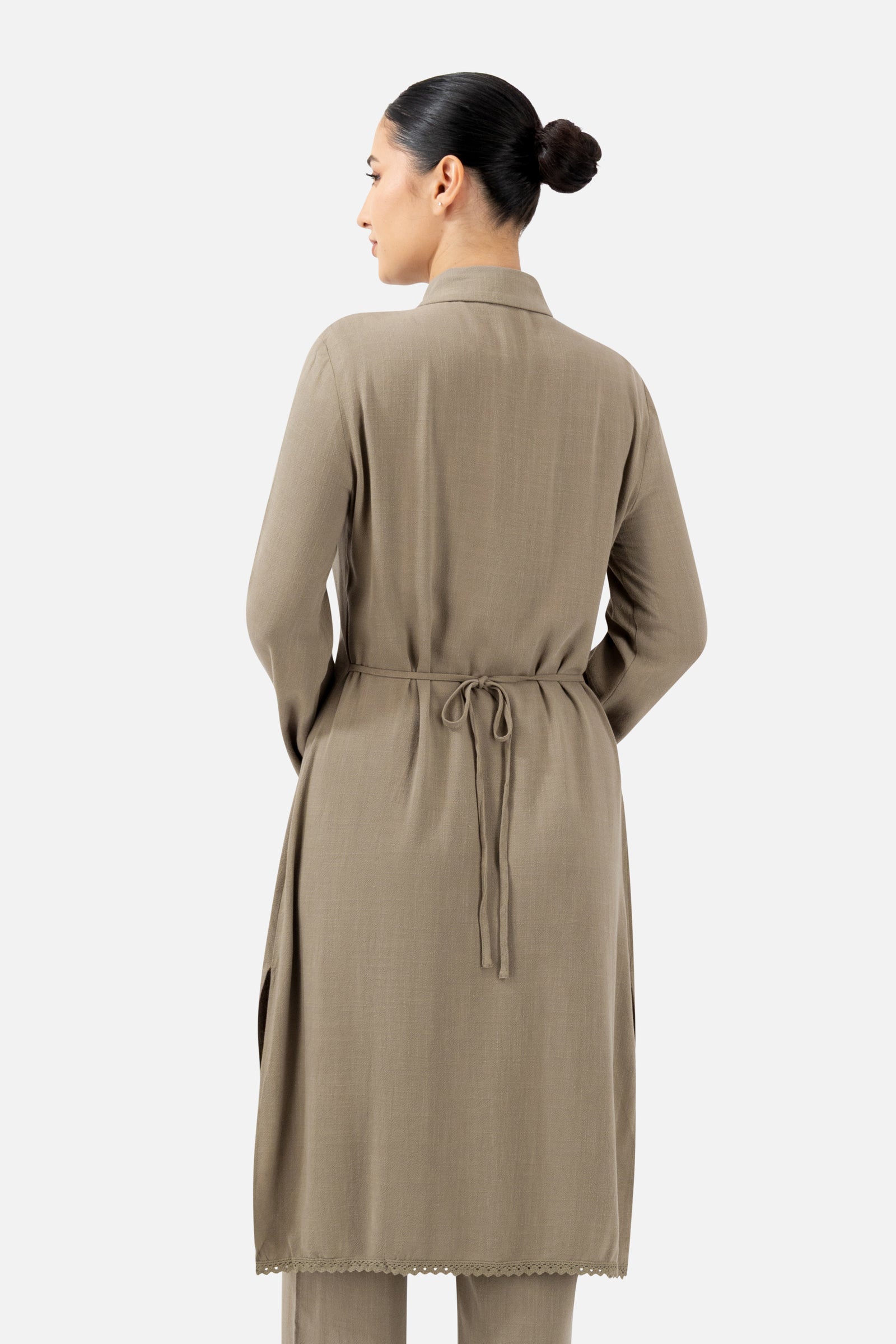 Back view of the Haze button-up long-sleeve tunic showcasing the relaxed fit and waist detail.