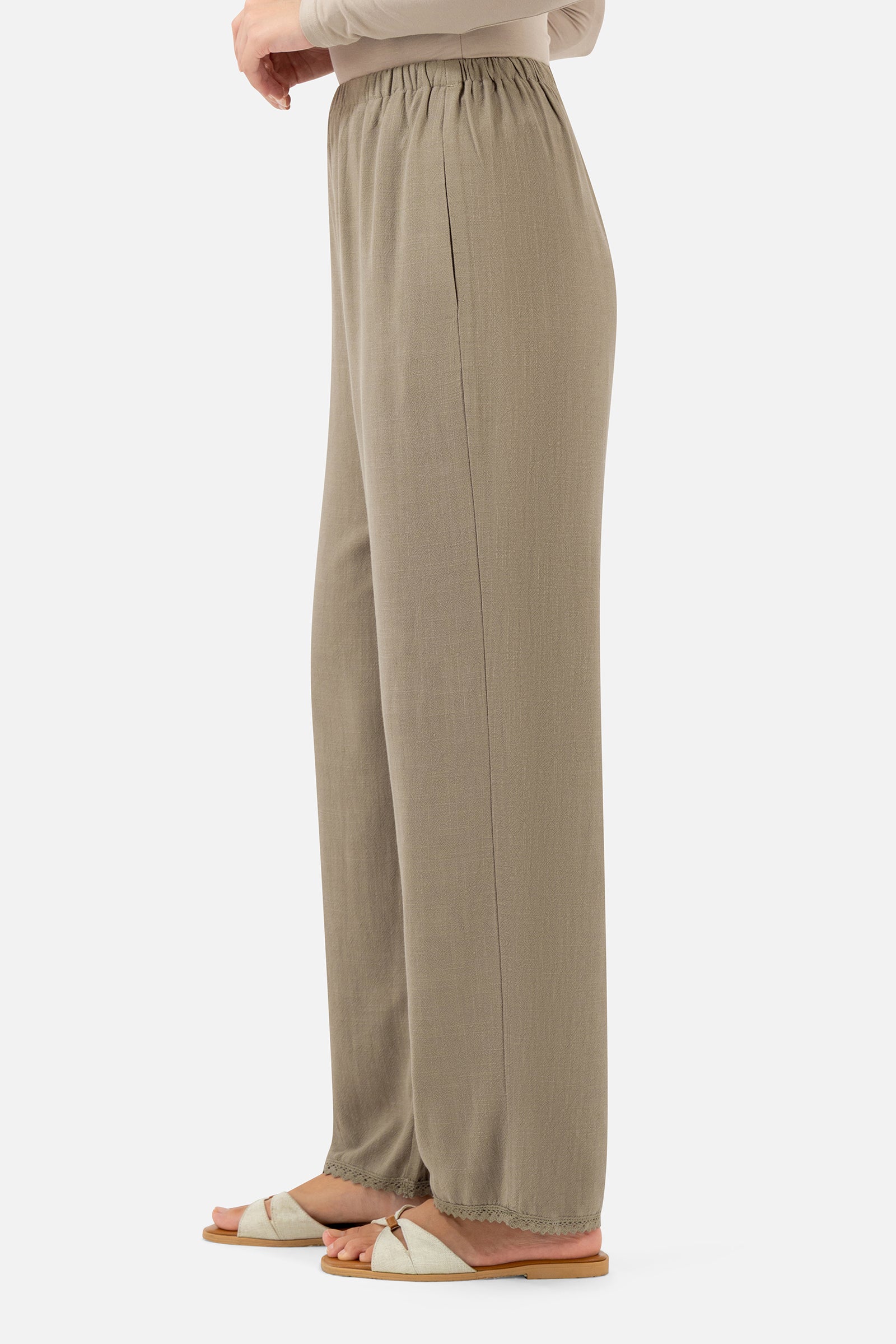Side profile of the Haze Relaxed Fit Pants highlighting the flowing wide-leg silhouette.