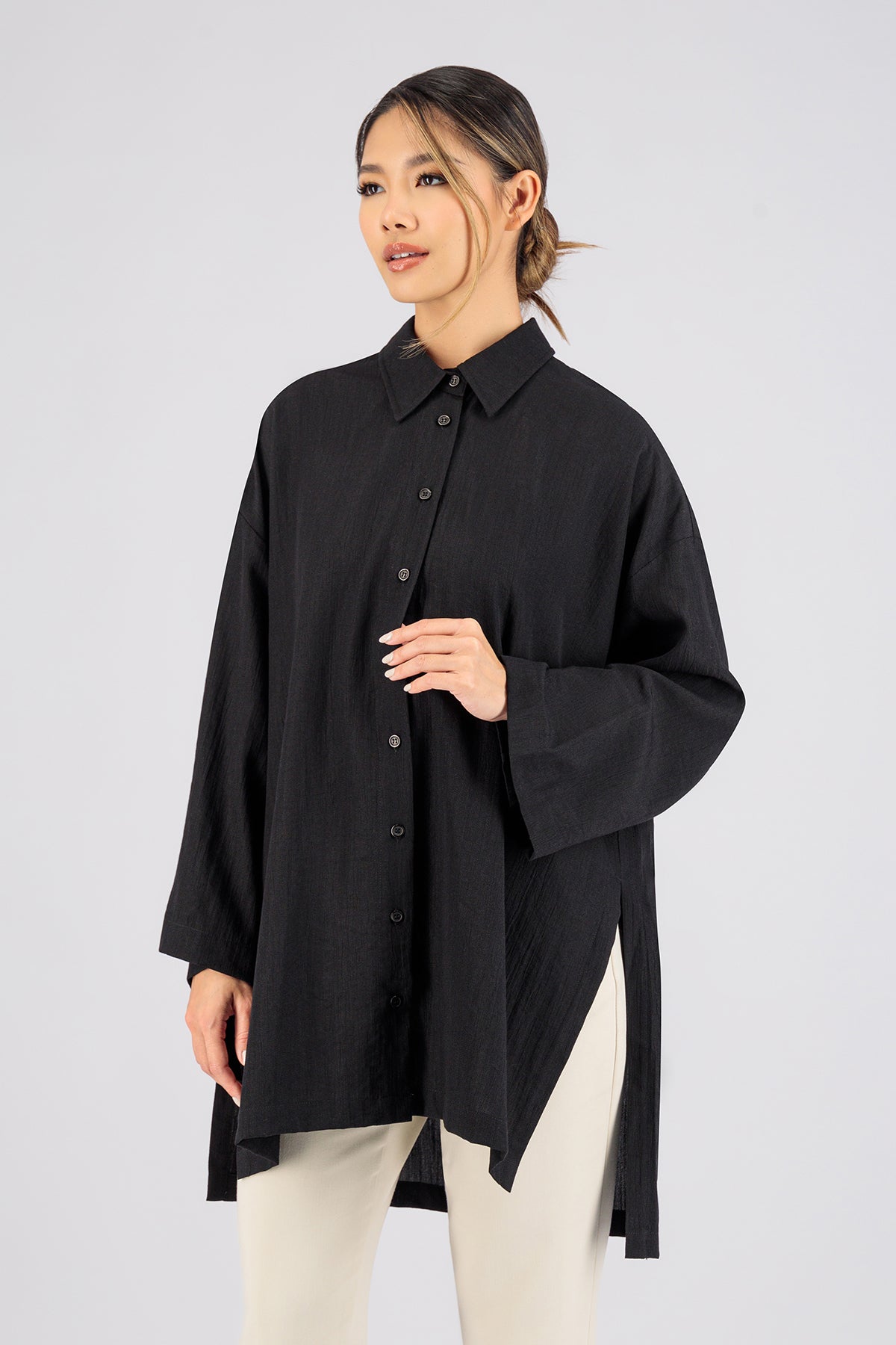 Colour: Black. A front pose of a model wearing a Wide Sleeve Tunic.
