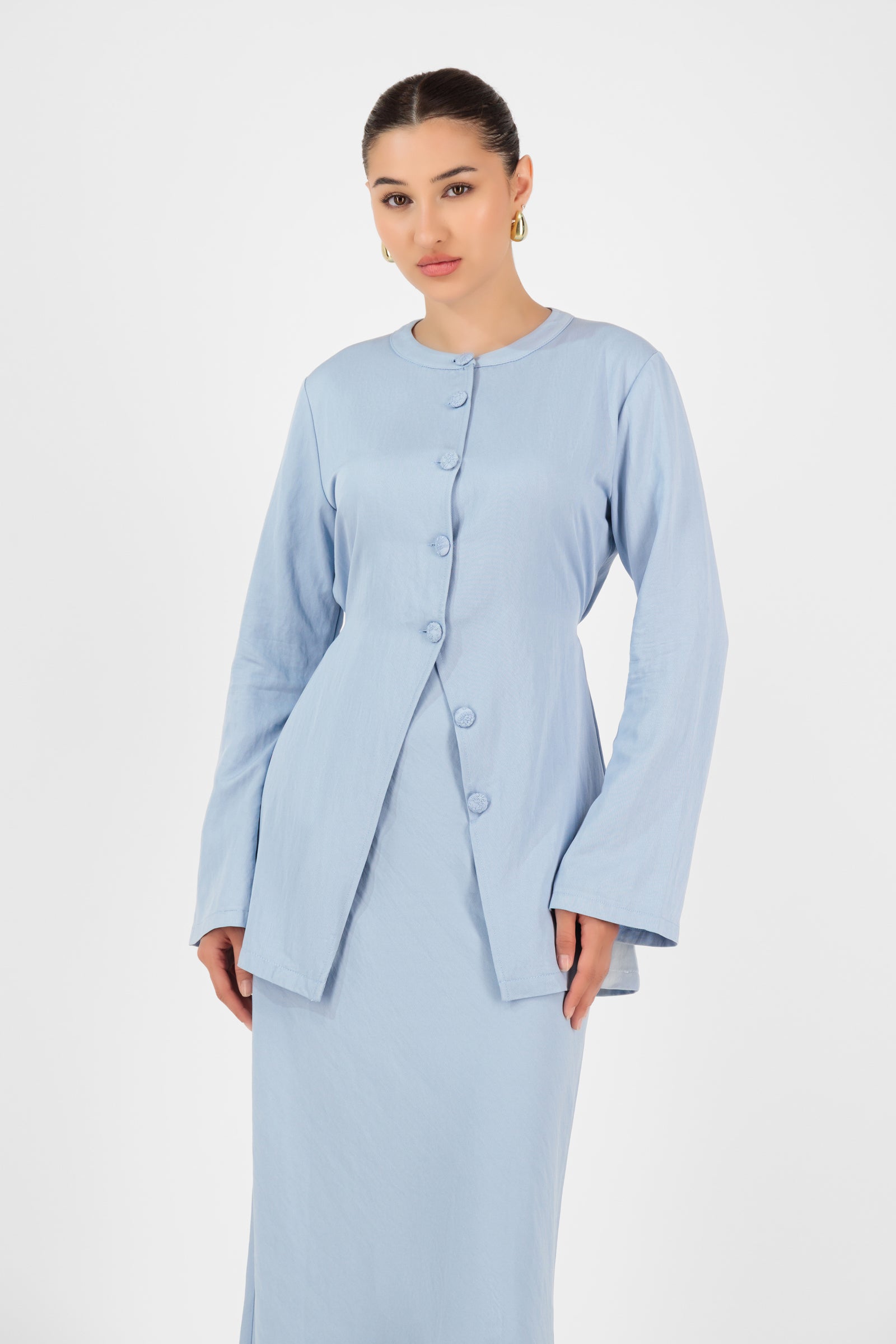 Front view of the FARES Tailored Vintage Lightweight Cardigan in Powder Blue, a refined long cardigan with a soft drape and vintage-inspired cut.