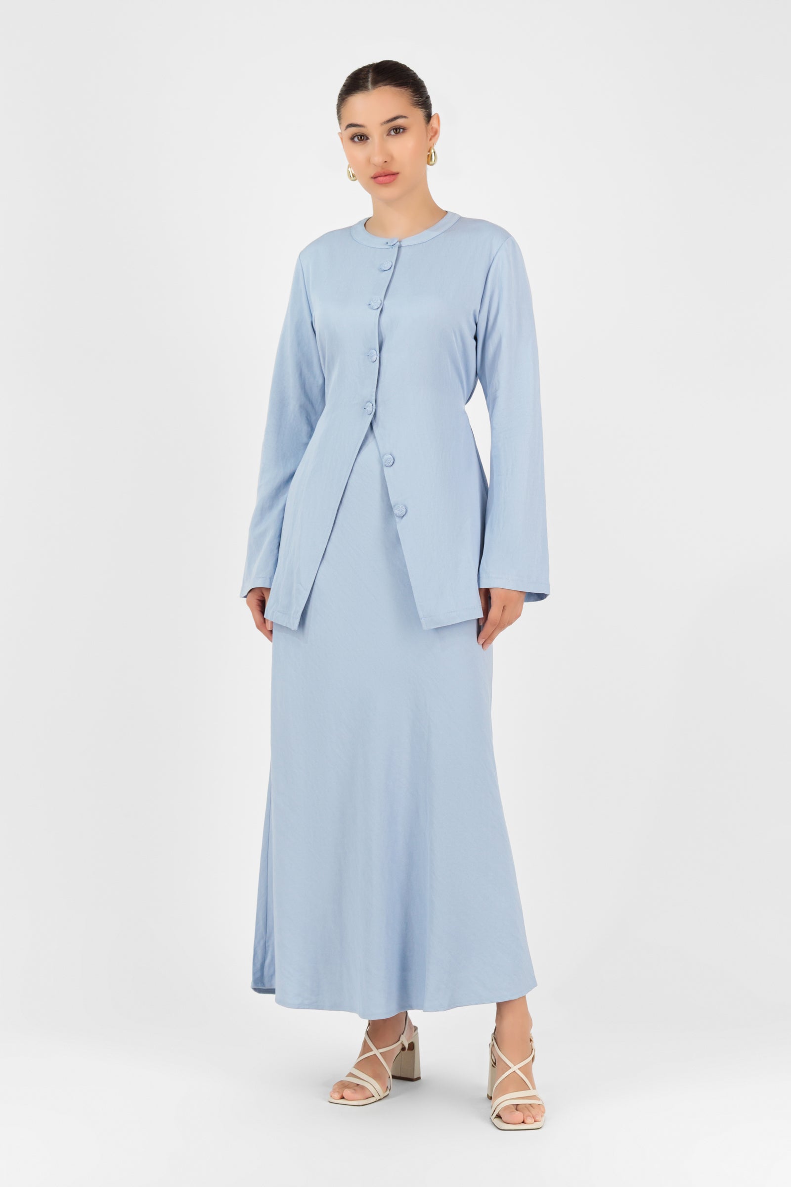 Model wearing the FARES Tailored Vintage Lightweight Cardigan in Powder Blue, styled casually to show the elegant everyday appeal of long cardigans for women.