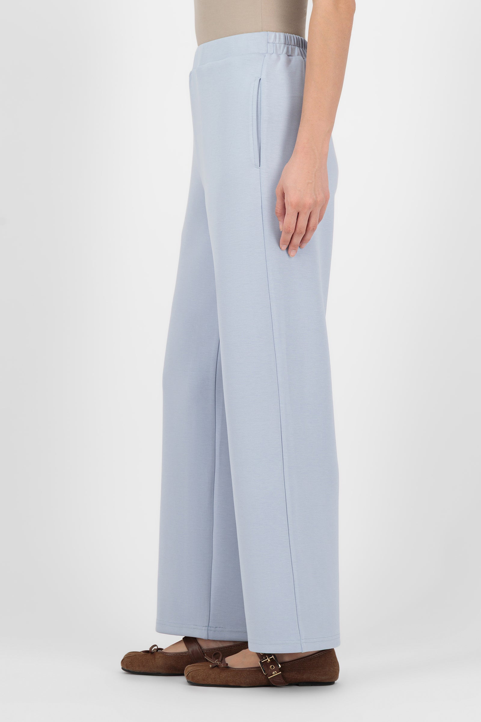 Side angle of the Bluebell Buttery Straight Leg Trousers highlighting the relaxed straight silhouette and soft drape, giving these trouser pants for women a refined feel.