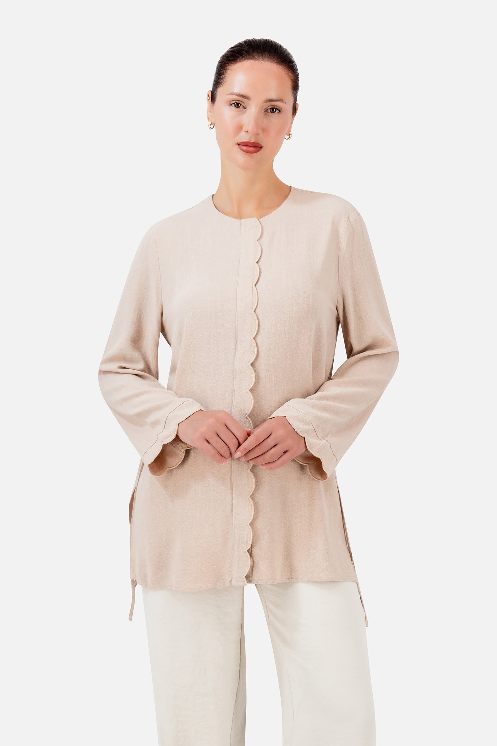 FARES Scalloped Detail Linen Blend Top in Shell shown from the front, highlighting the scalloped trim and softly gathered side details.