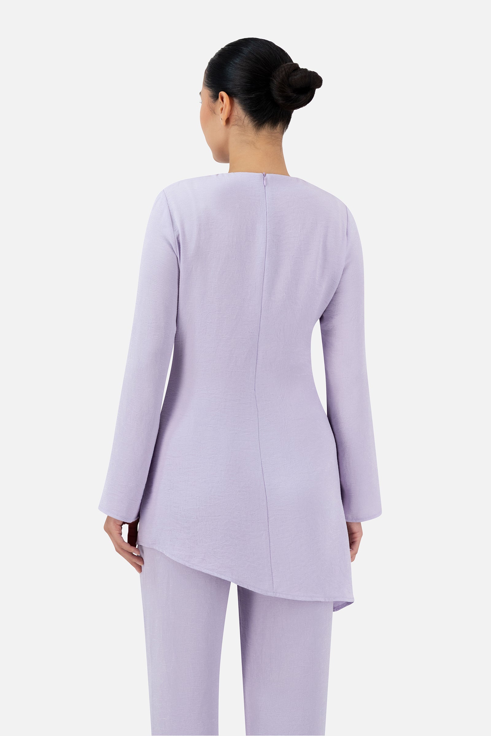Back view of the Lilac tunic showcasing the clean lines and comfortable fit.