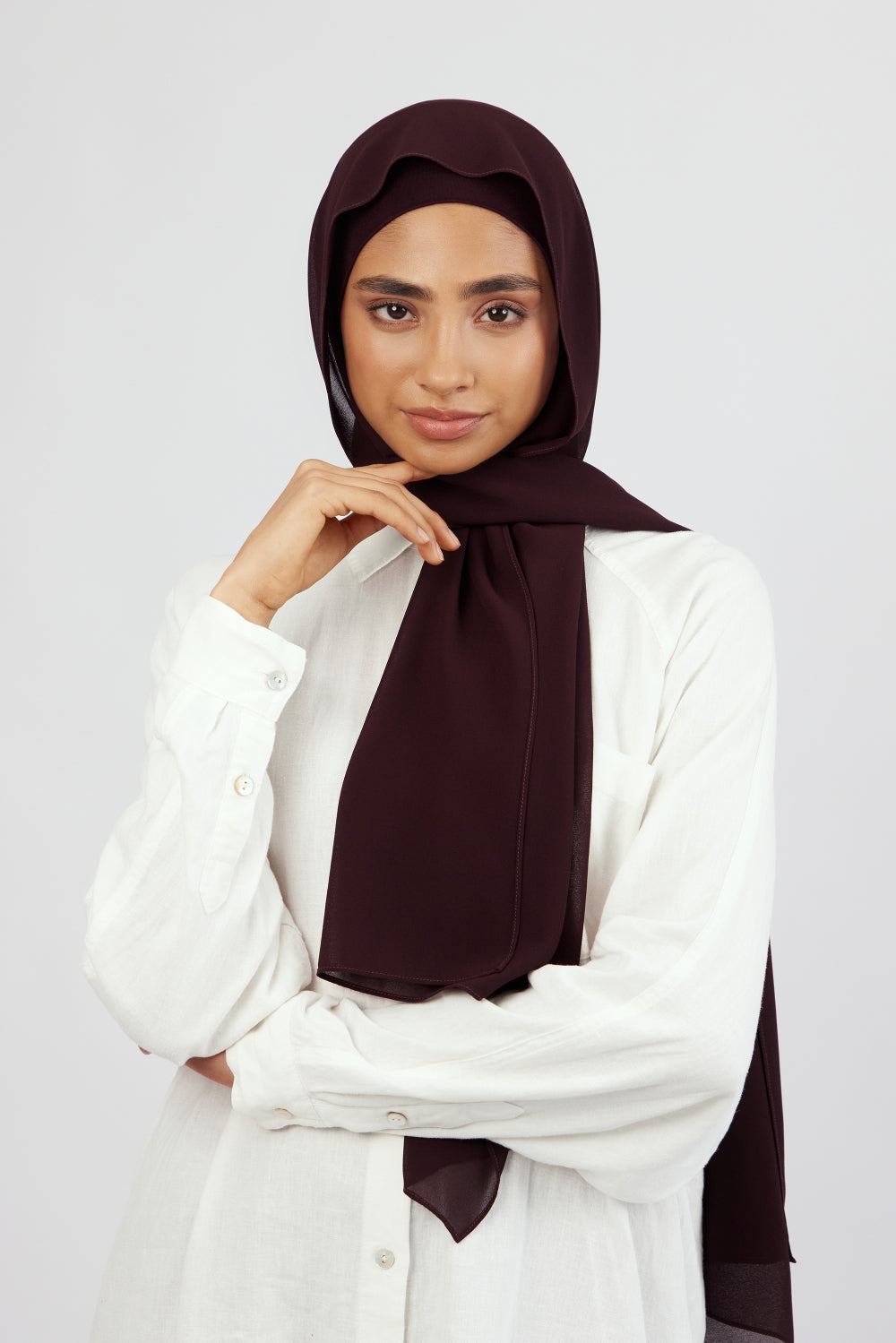 Deep plum coloured matching chiffon Hijab set. The set includes a chiffon Hijab and matching modal jersey undercap. With a unique and customized shade, it is a FARES exclusive.