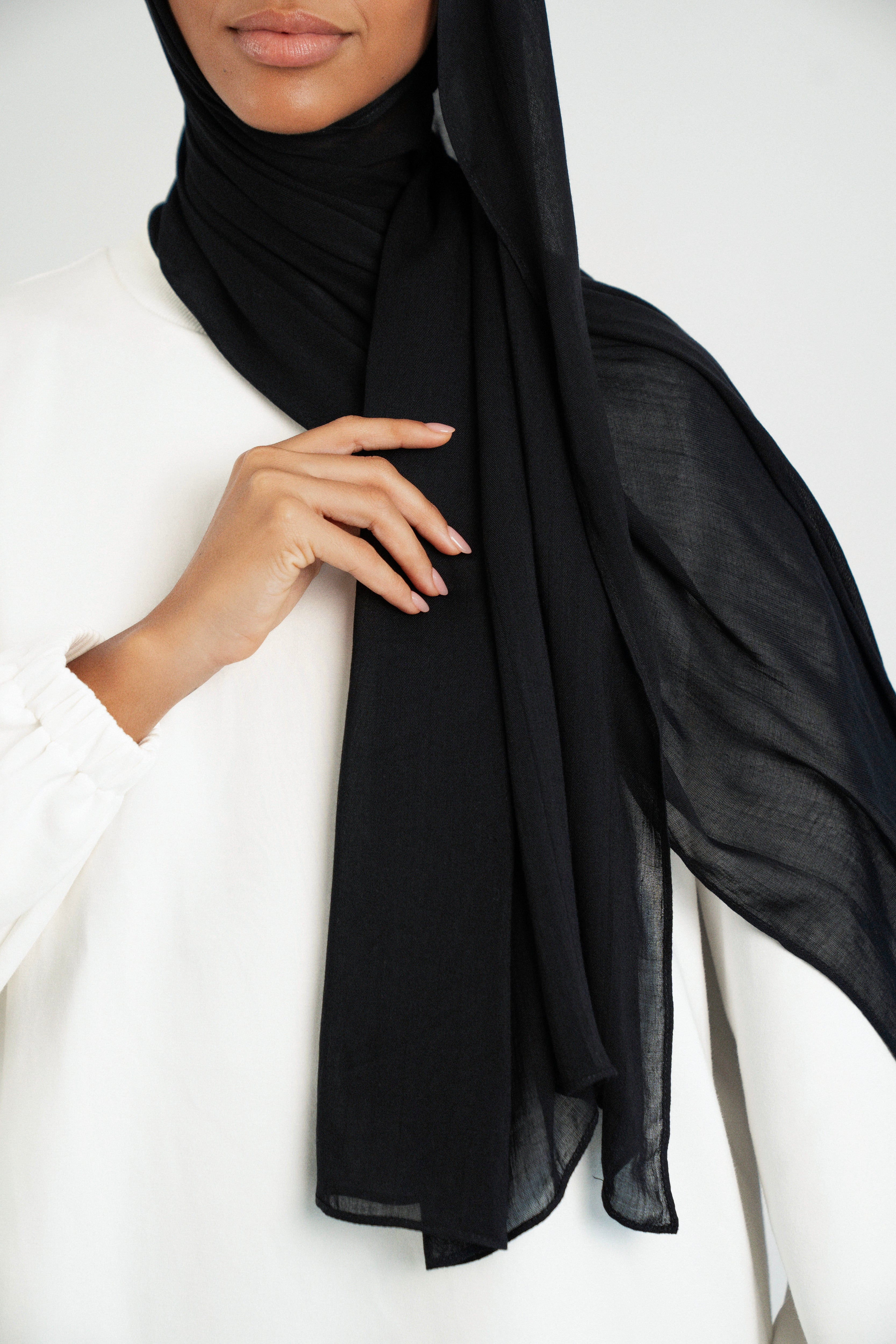 Colour: Black. A shoulder view of a Matching Butter Modal Hijab Set.
