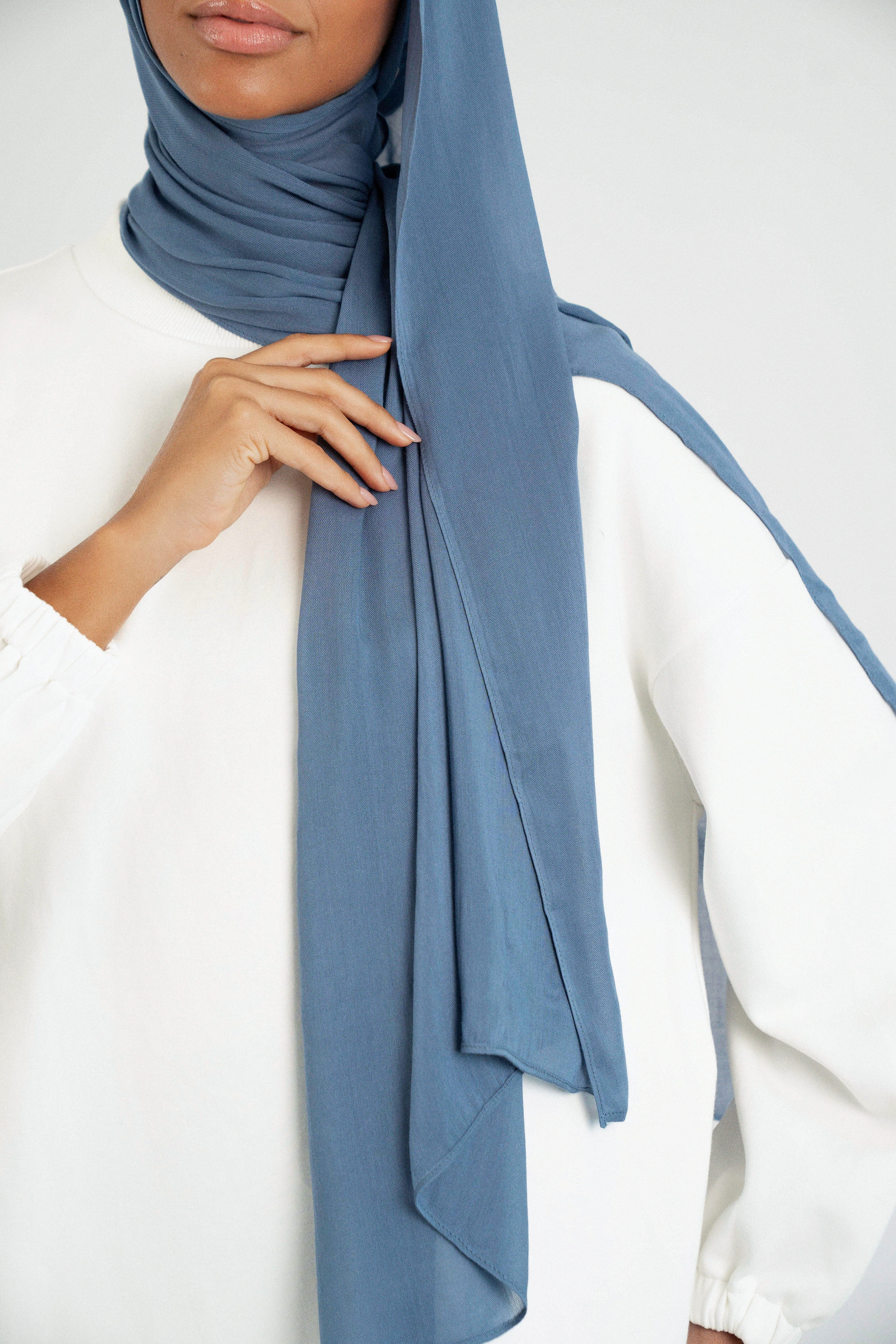 Colour: Denim. A shoulder view of a Matching Butter Modal Hijab Set.