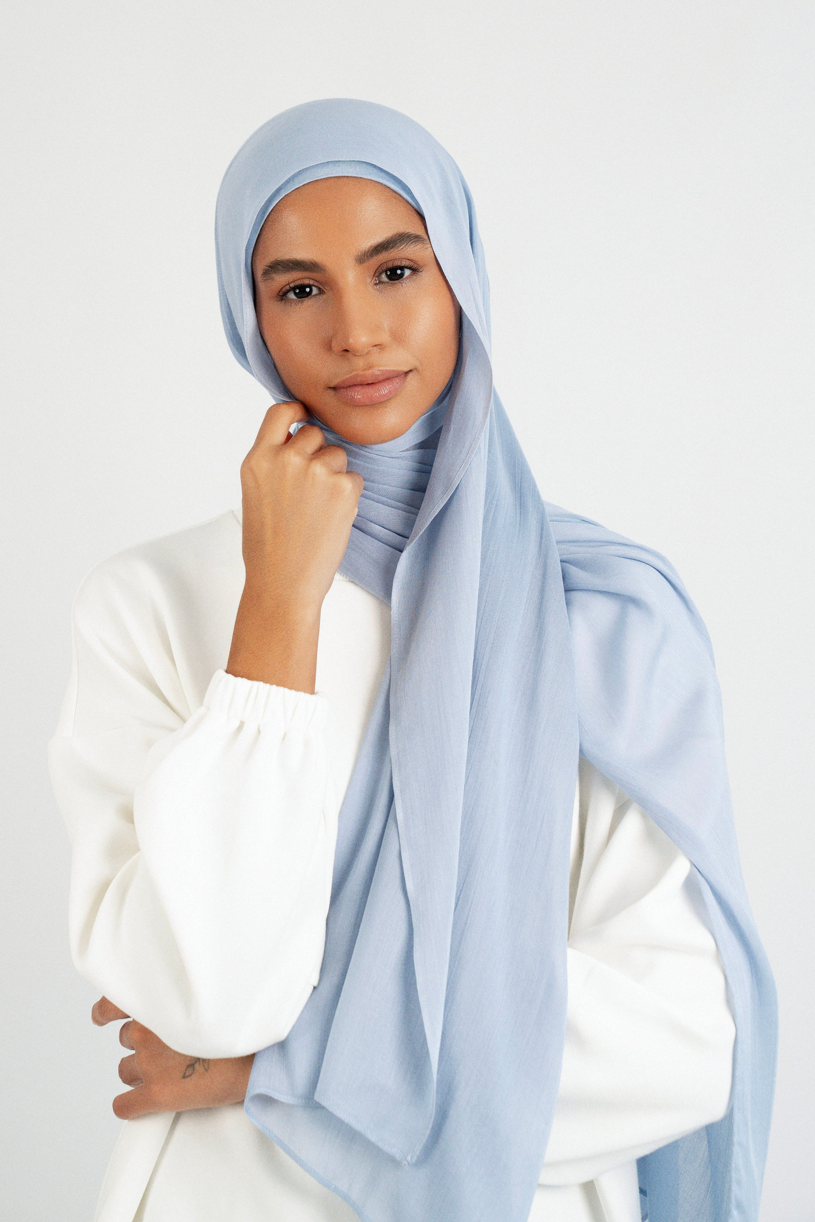 Colour: Mist. A front pose from a model in a Matching Butter Modal Hijab Set