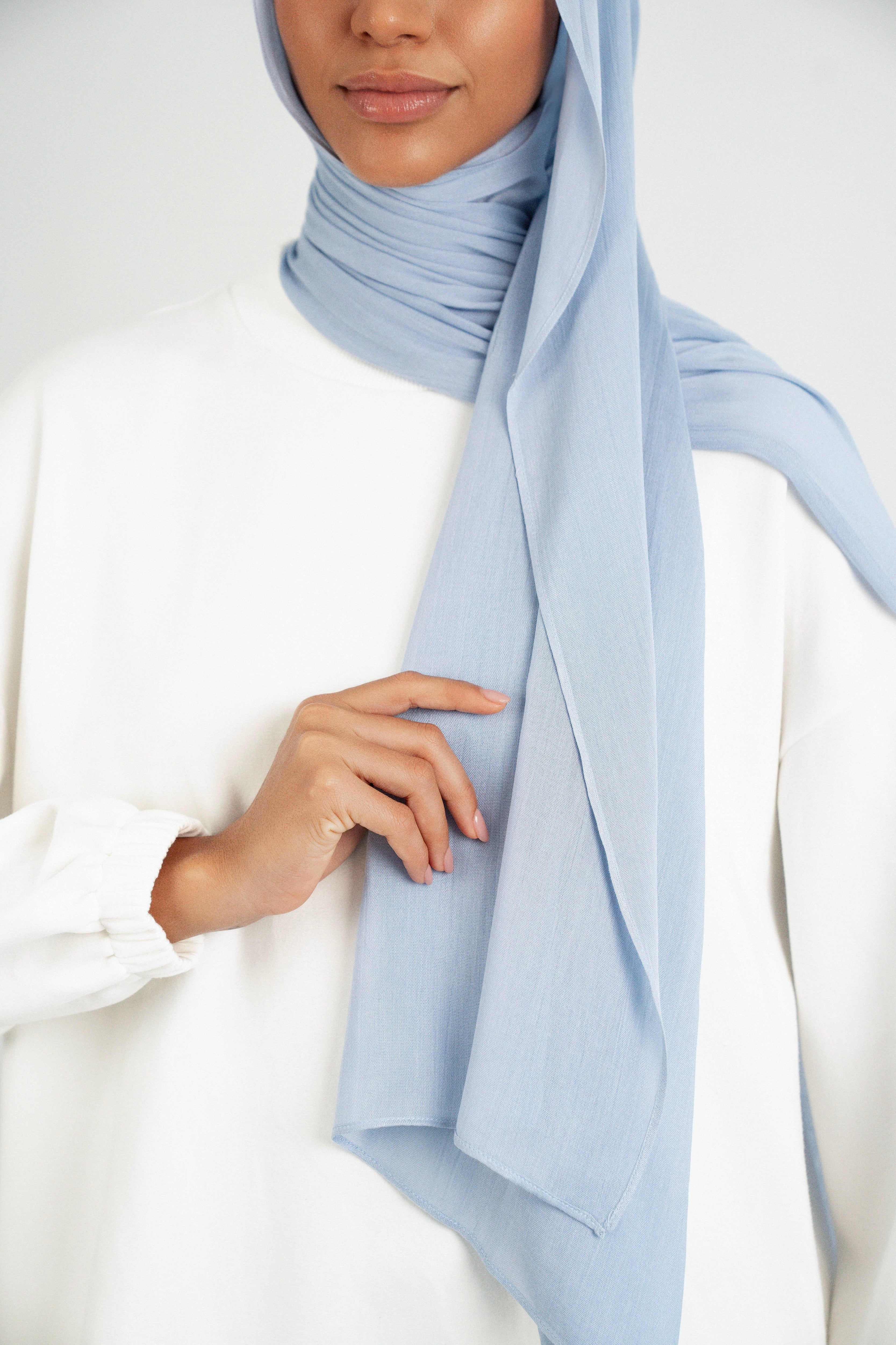 Colour: Mist. A shoulder view of a Matching Butter Modal Hijab Set.