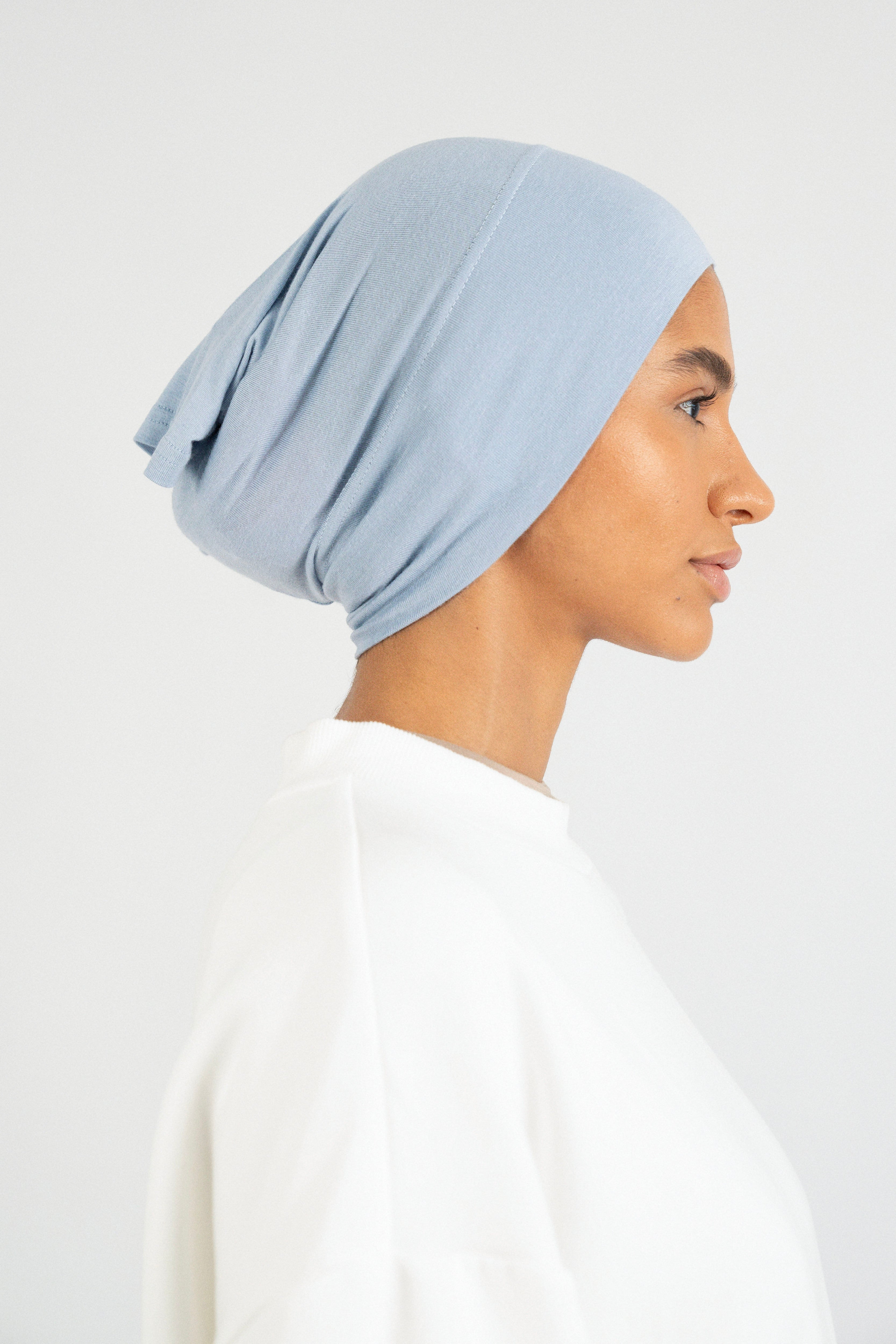 Colour: Mist. The right profile of a girl wearing a modal hijab undercap.