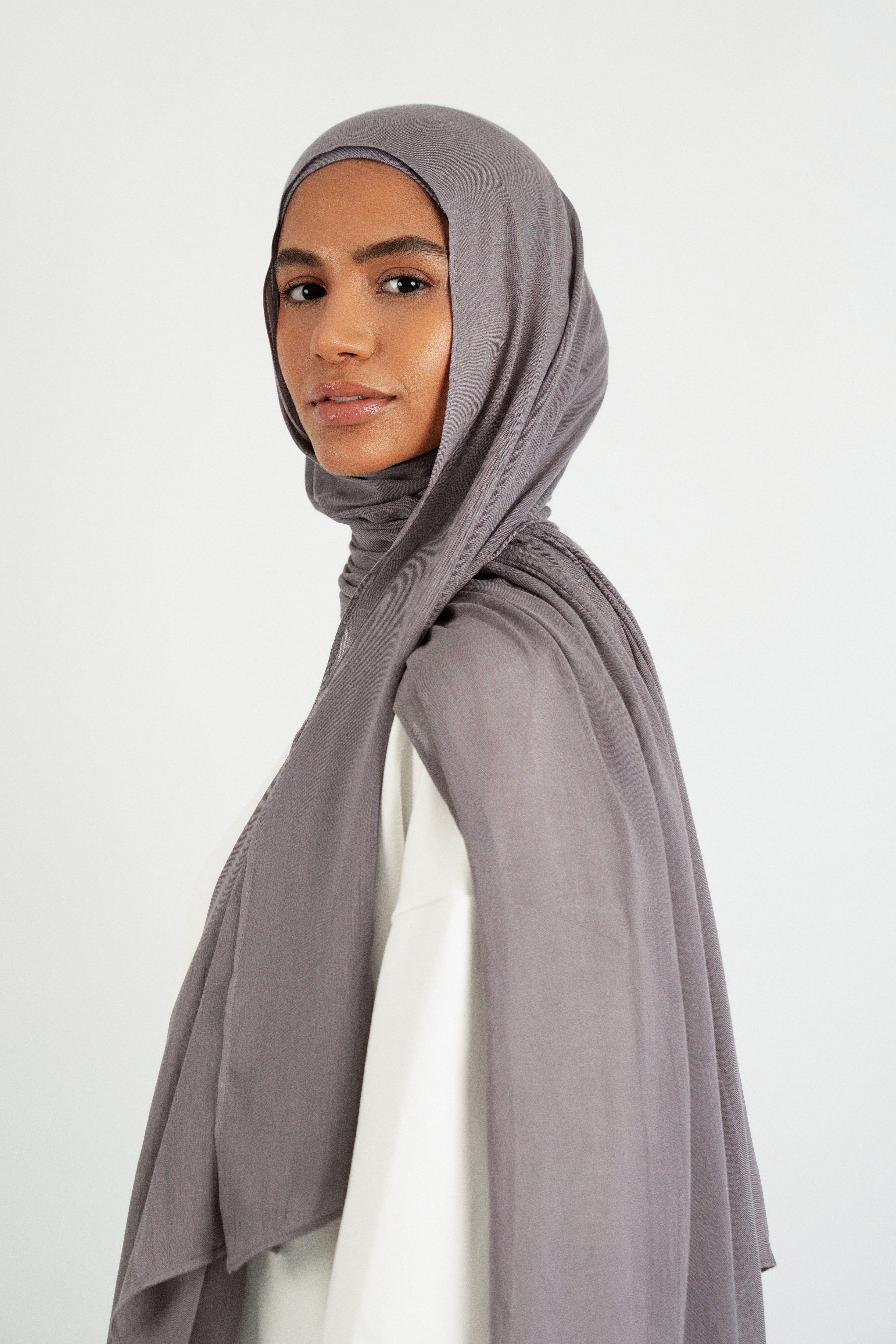 Colour: Moon. A side pose from a model in a Matching Butter Modal Hijab Set.