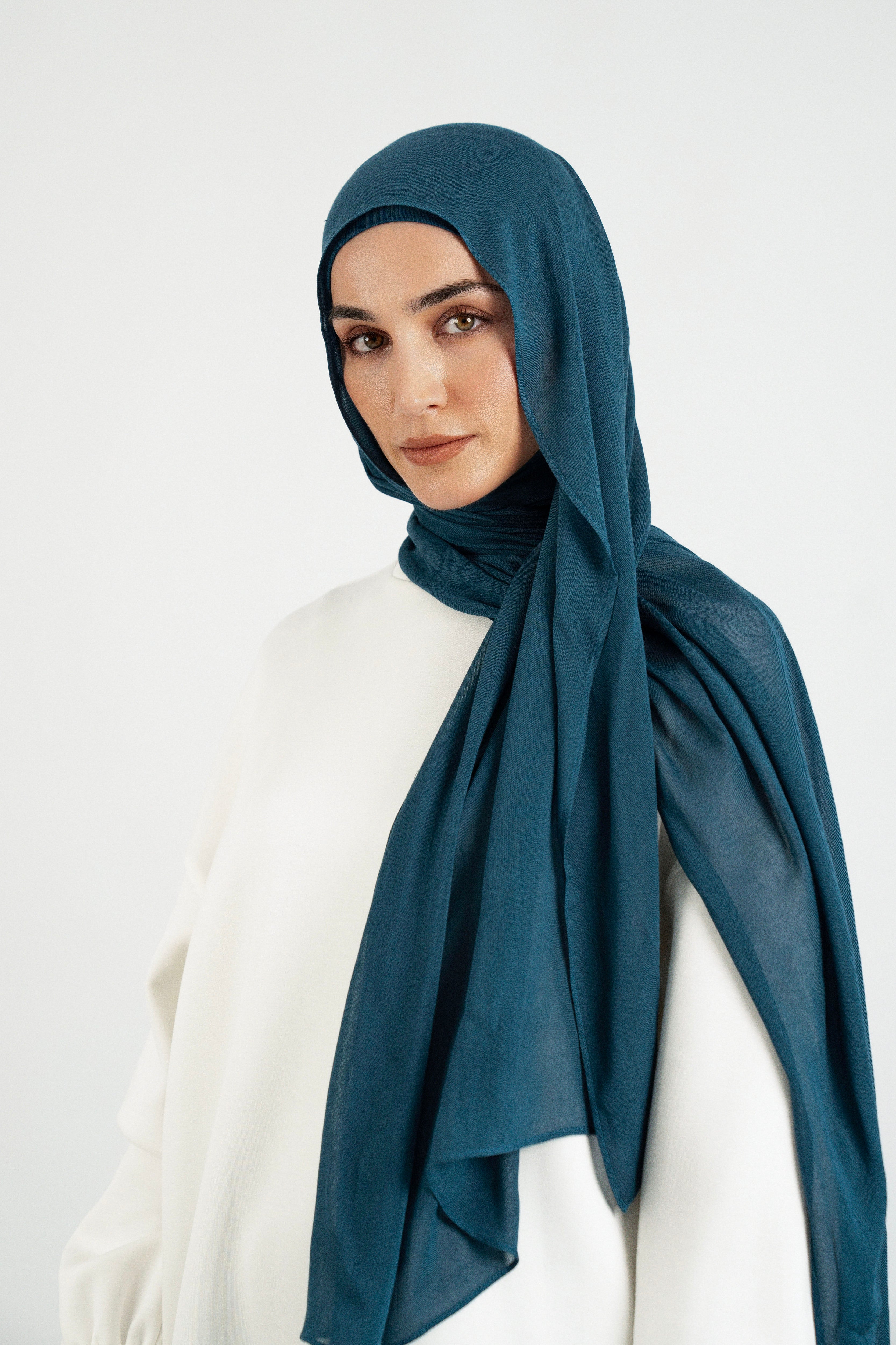 Colour: Real Teal. A front pose from a girl in a Matching Butter Modal Hijab Set