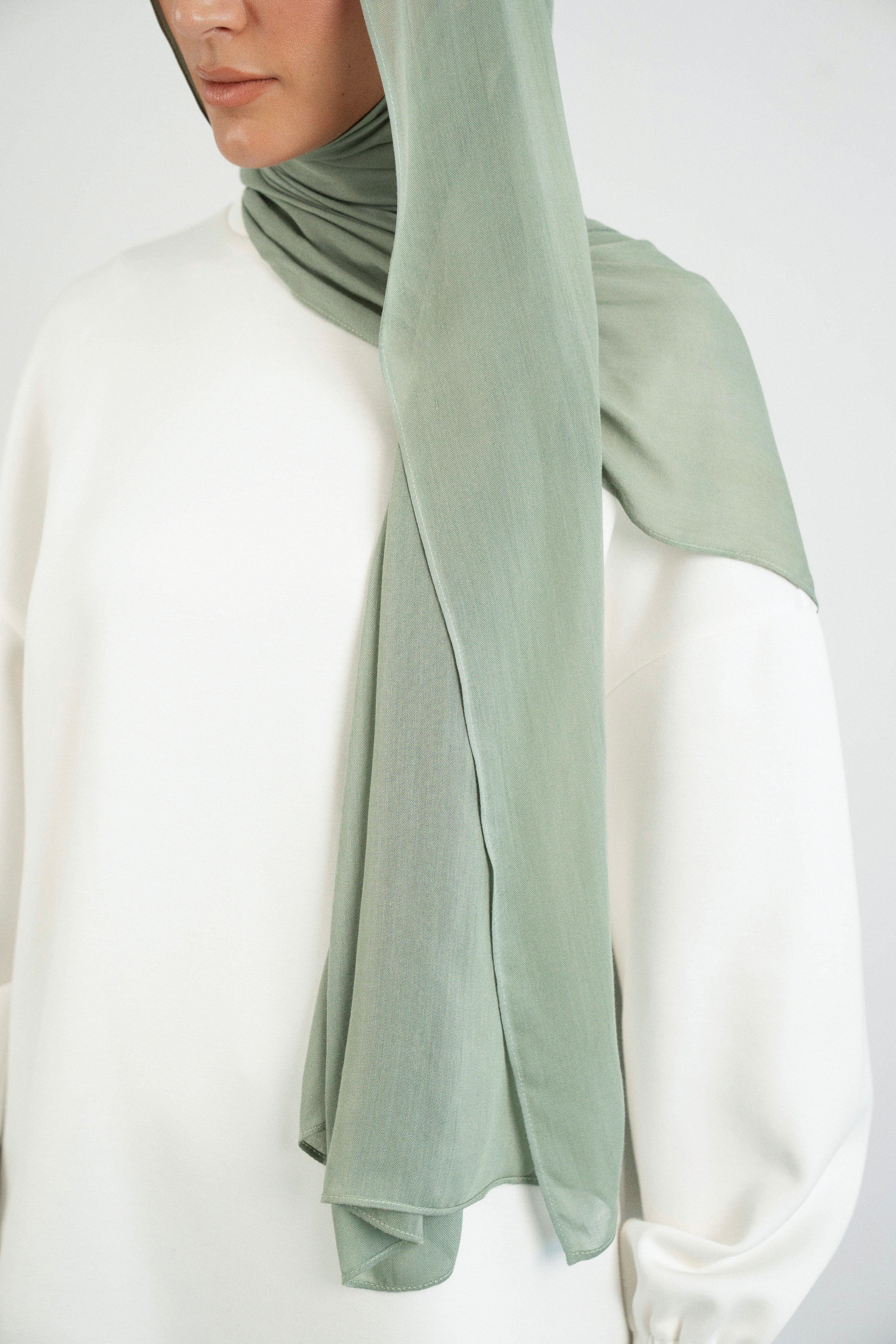 Colour: Sage. A shoulder view of a Matching Butter Modal Hijab Set.