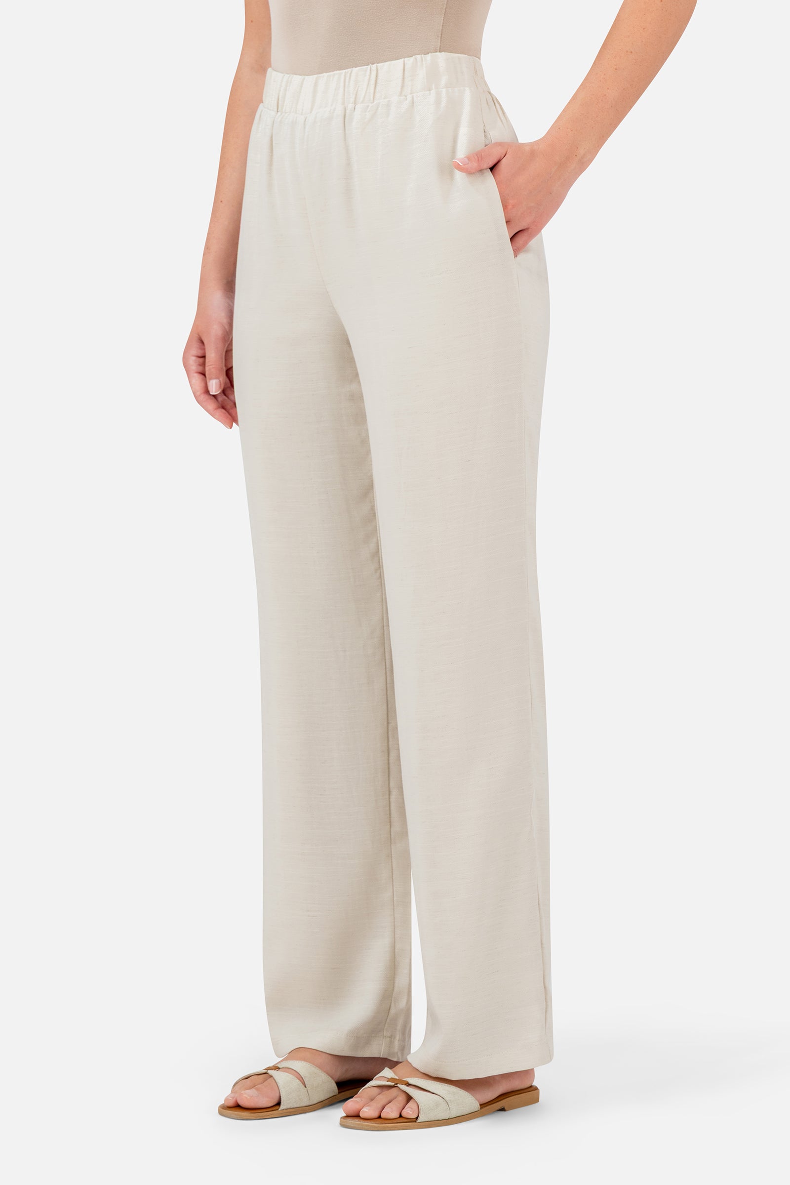 FARES Relaxed Fit Pants in Bare shown at an angle, highlighting the easy silhouette and relaxed fit of these pants for women.