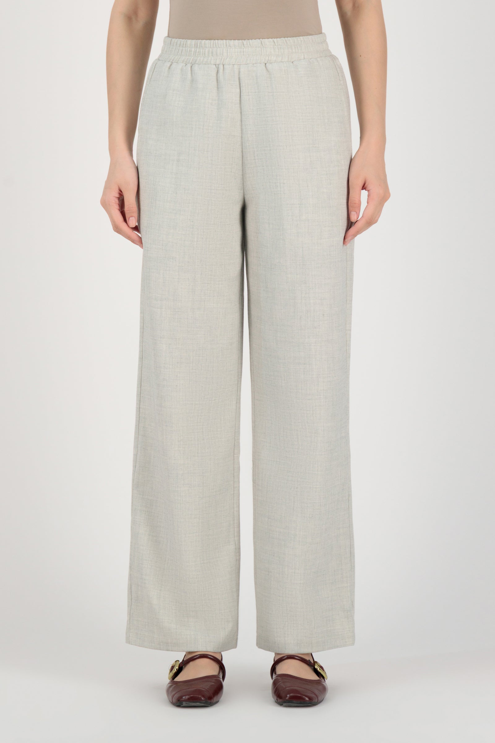 FARES Tailored Elastic Waist Pants in Chalk shown from the front with clean lines, presenting relaxed elastic waist pants in a soft wide leg pants silhouette.