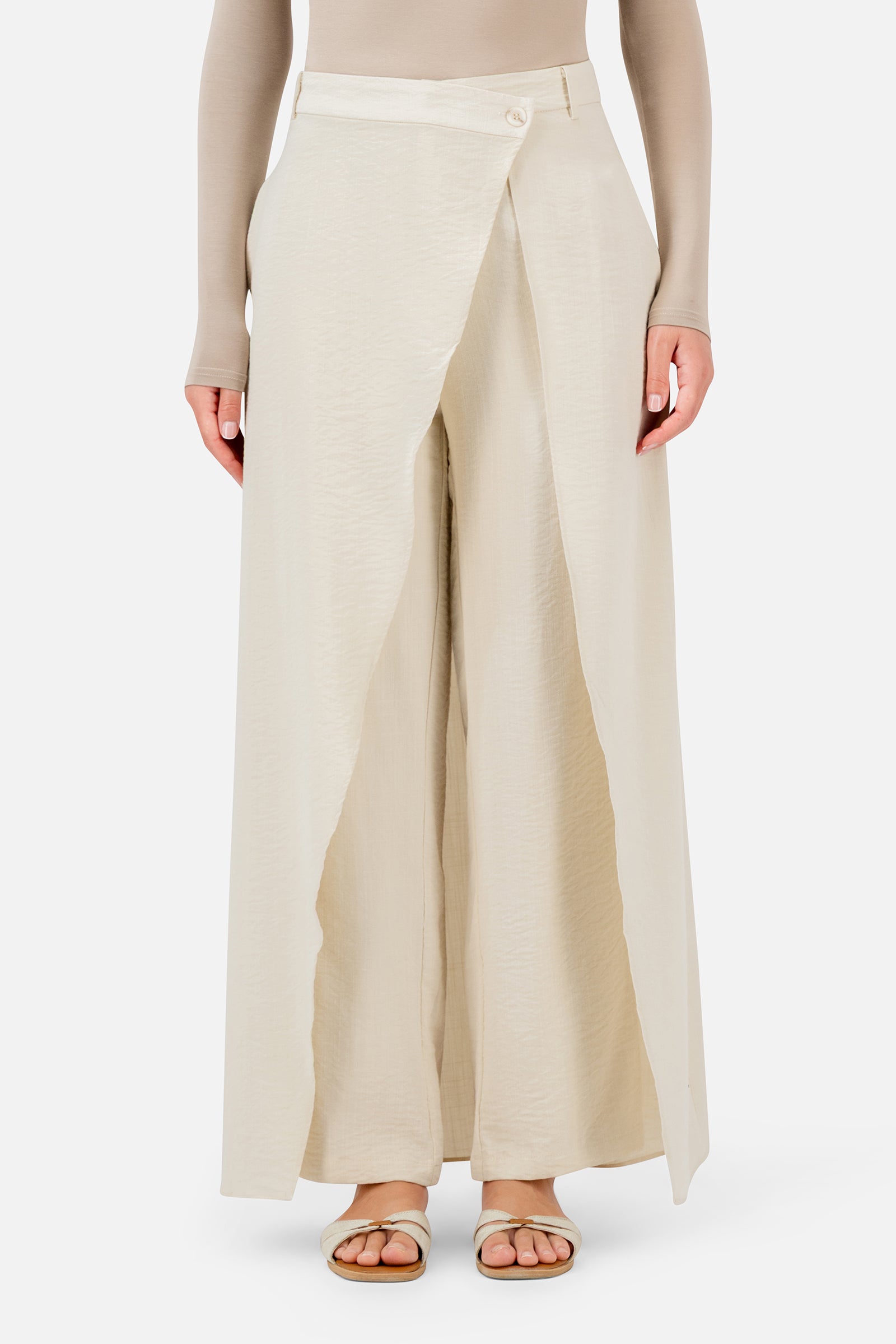 FARES Skirt Overlay Trousers in Oats, flowing wide-leg trousers with a layered skirt overlay that gives the silhouette a distinctive finish.