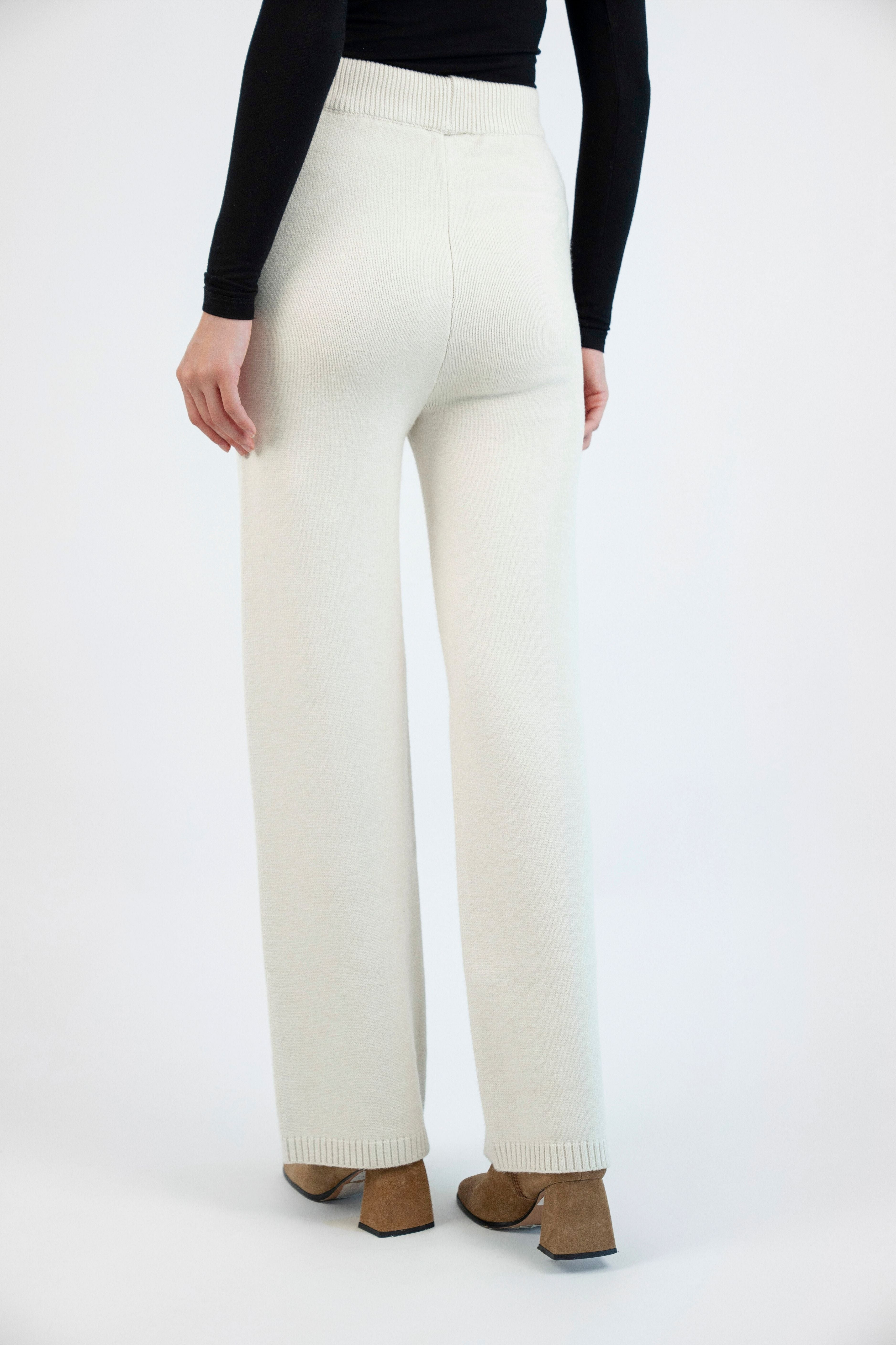 Back view of the Cloud Knit Pants in Cream – high-waisted, flowy design with a flattering silhouette perfect for everyday wear.
