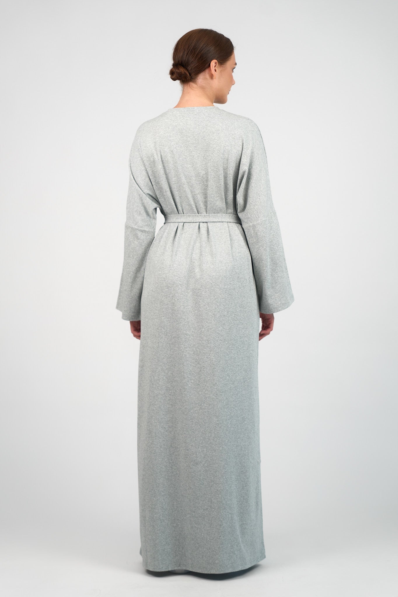 Colour: Grey Haze. A girl from the back in a Cotton Maxi Dress