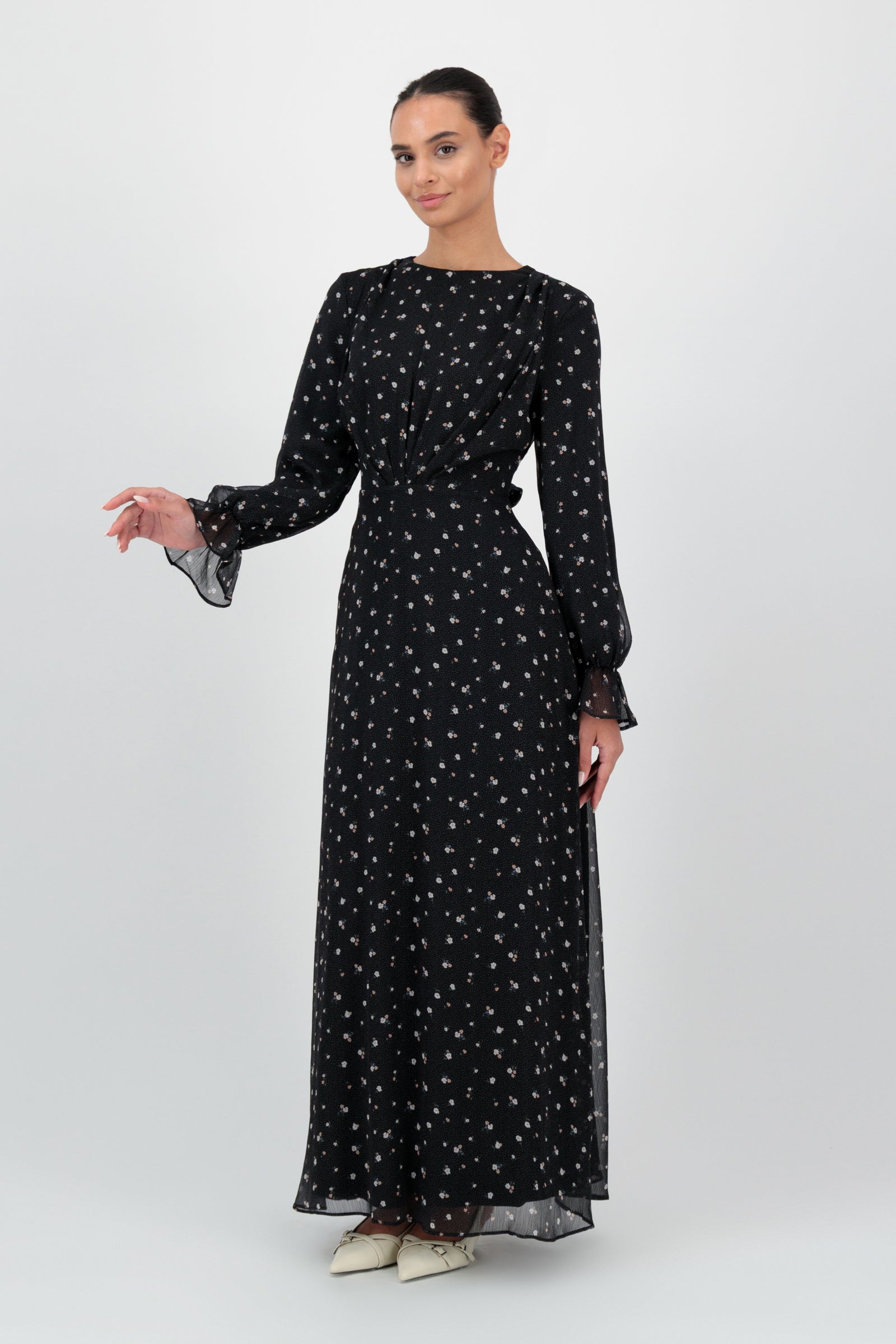 Side view of the FARES Waist Wrap Chiffon Dress in Nightbloom highlights the airy drape of this lightweight chiffon dress.