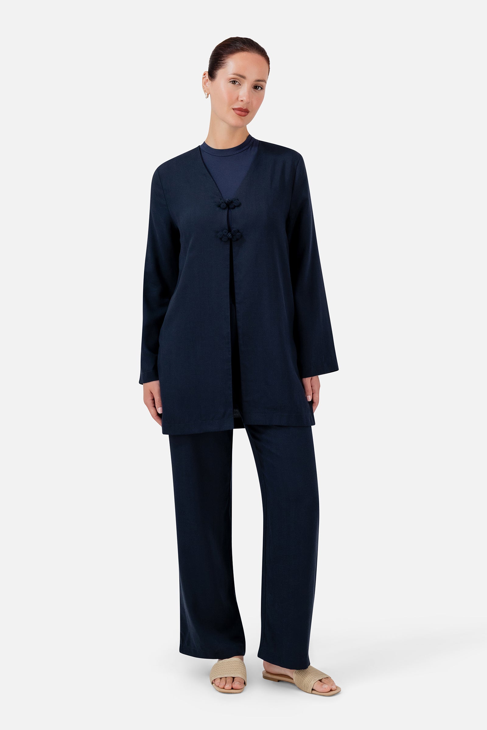 FARES Relaxed Fit Pants in Navy styled with a matching navy top, showing how these relaxed fit pants create an effortless coordinated look.
