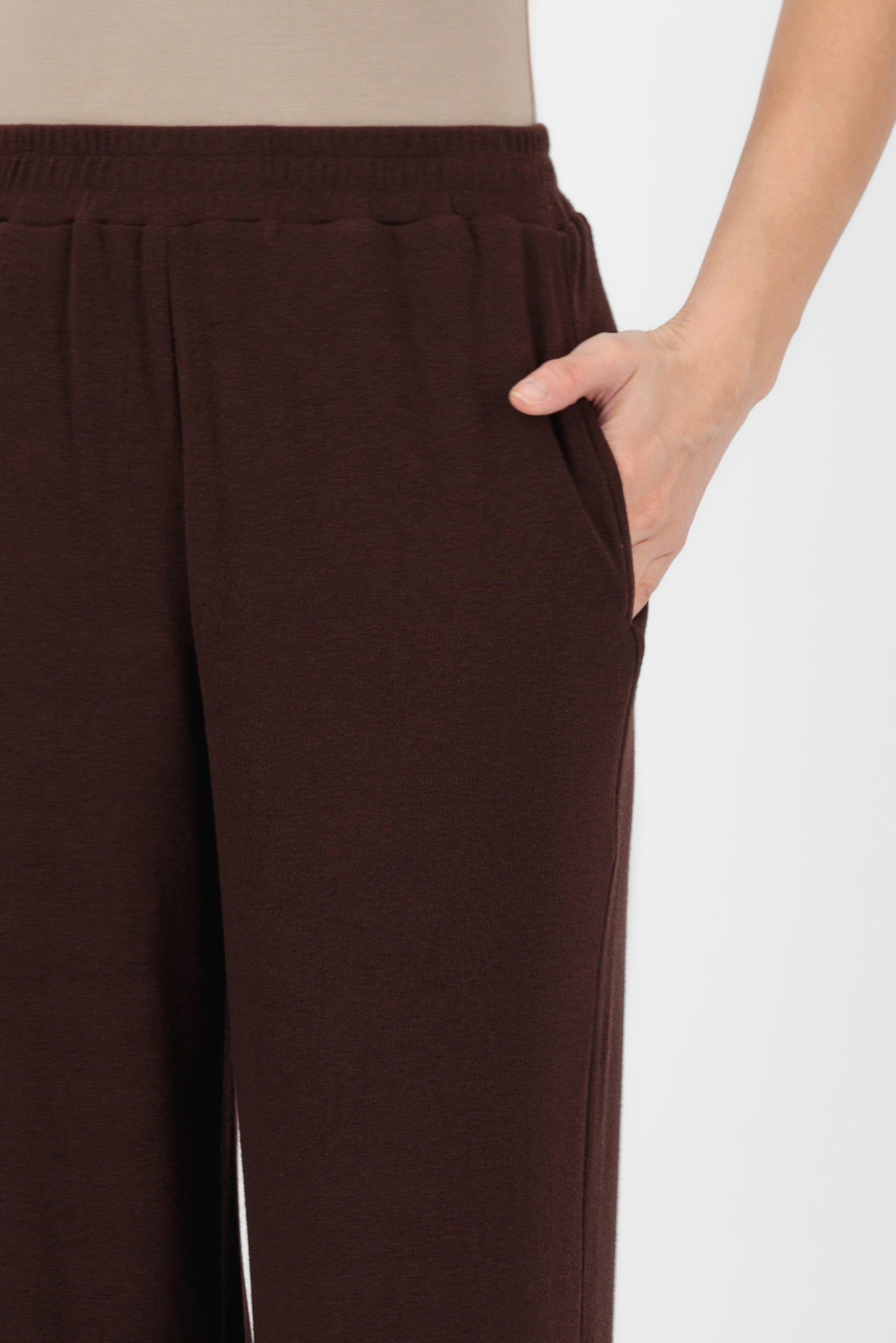 Close-up of the Straight Leg Knit Pants in Espresso focusing on the ribbed knit texture, waistband detail, and quality stitching that elevate classic straight leg pants.