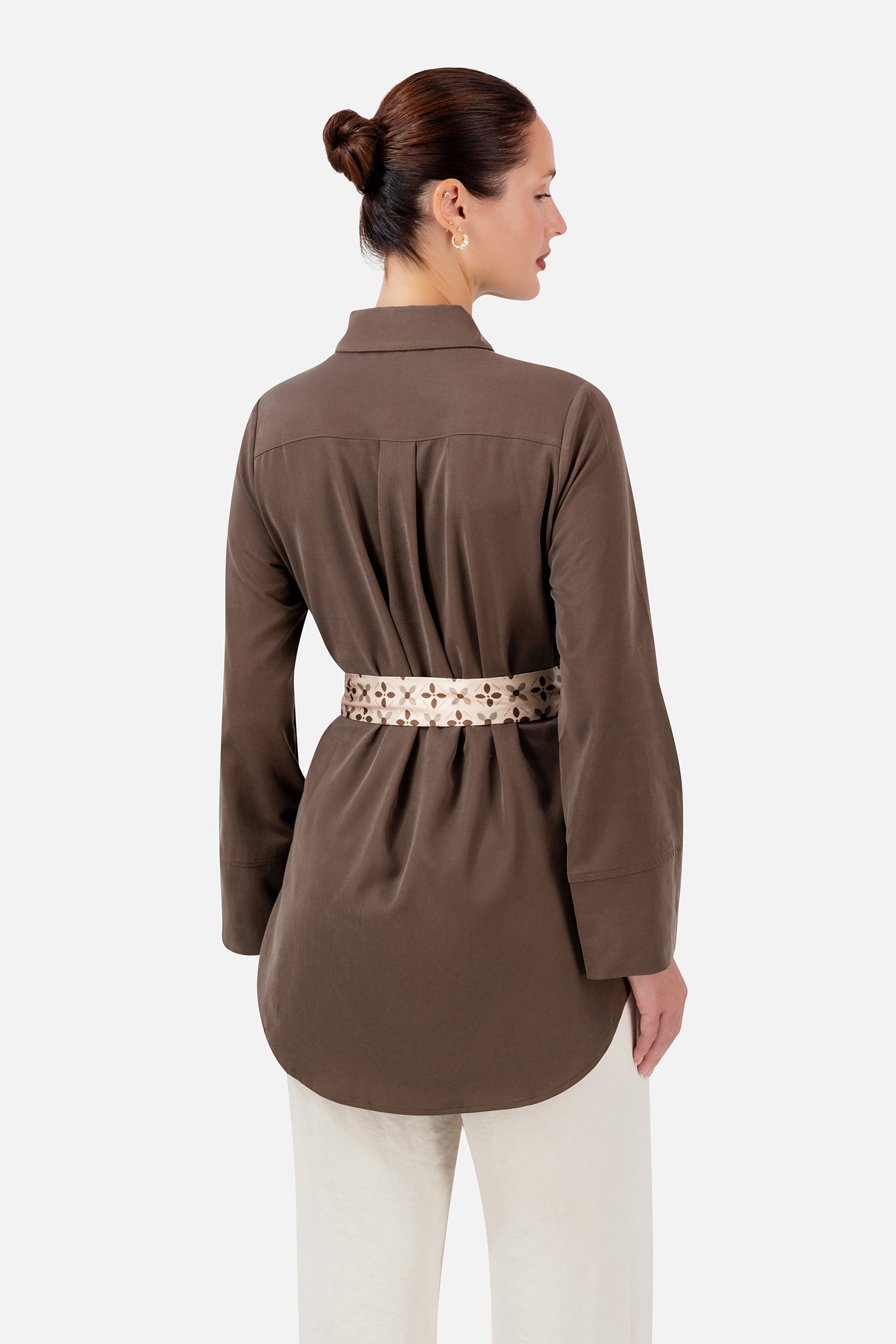 FARES Printed Wrap Belt Button Up in Mocha shown from the back, highlighting the relaxed longline shape and printed belt wrapped around the waist.