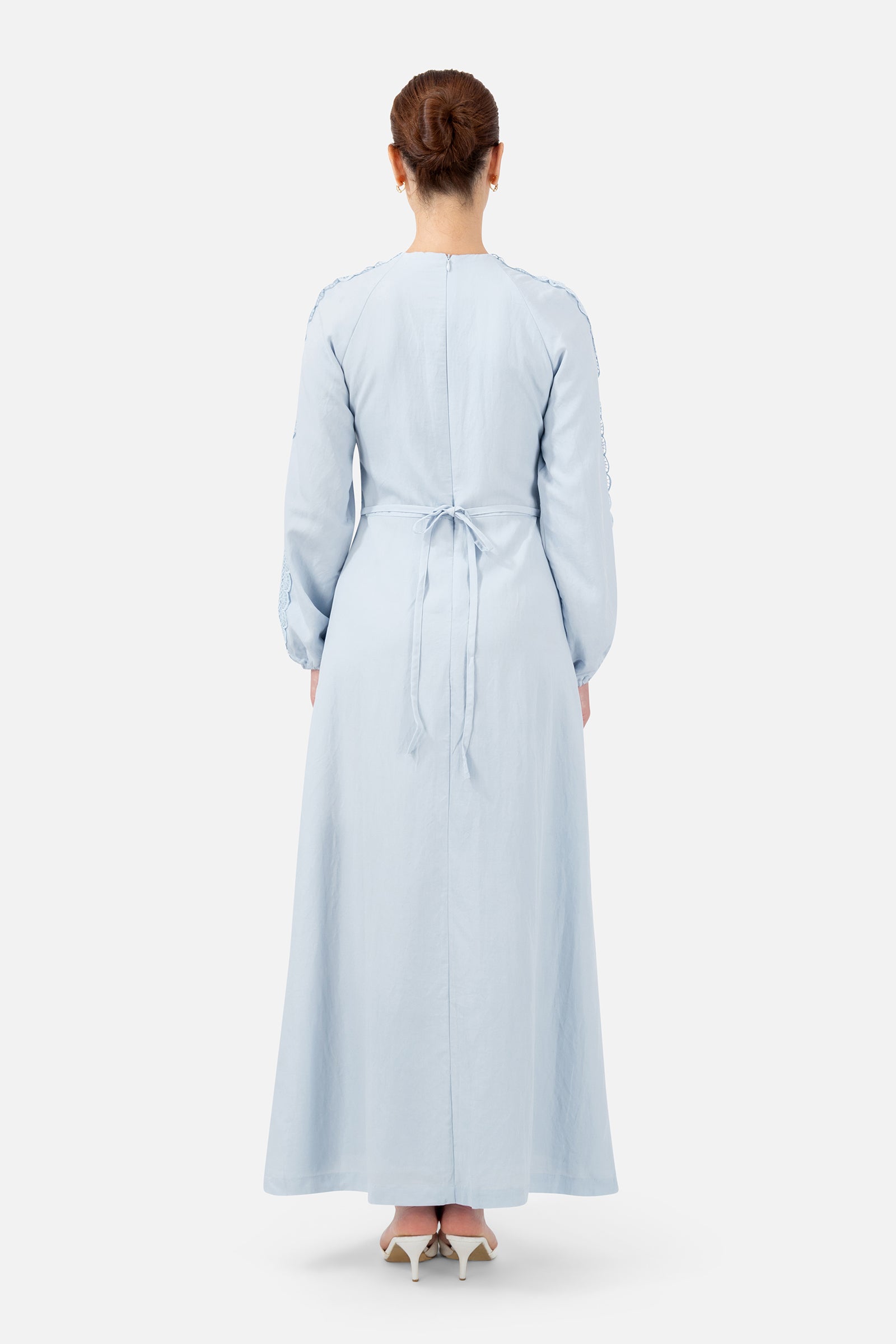 Back view of the Bluebell maxi dress showcasing the full-length design and elegant fit.