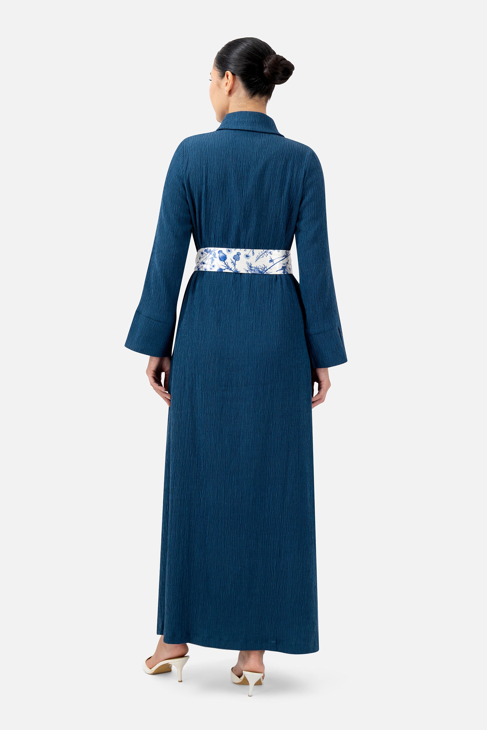 Back view of the Indigo printed dress showcasing the full-length design and elegant fit.